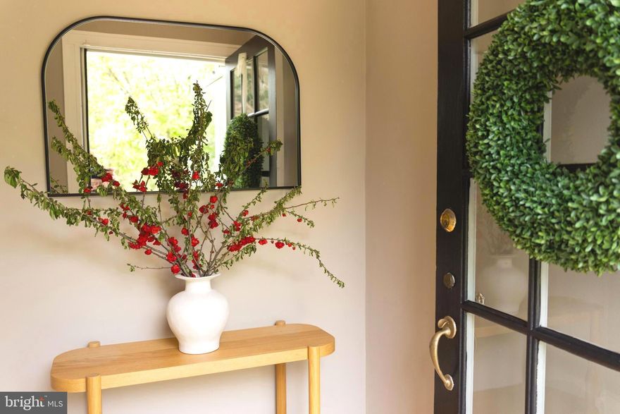 Nestled on a serene, tree-lined street in one of Baltimore’s most cherished neighborhoods, this thoughtfully renovated Mt. Washington home is a rare offering. Move-in ready homes with this level of character, thoughtful updates, and indoor-outdoor lifestyle appeal are hard to come by.

Natural light fills each room through well-placed windows, creating a bright, welcoming atmosphere. Hardwood floors and modern, on-trend light fixtures run throughout the main and upper levels. The open living room is centered around a classic fireplace, while a versatile den nearby offers space for a home office or reading nook.

The dining room connects to a sunny breakfast area, and the updated kitchen features stainless steel appliances, a high-end Jenn-Air oven, custom cabinetry, and ample prep space—ideal for everyday cooking and entertaining alike.

A main-level bedroom and full bath provide flexible living, perfect for guests or aging in place. Upstairs, two spacious bedrooms enjoy garden views and share a spa-like full bath with a walk-in shower, calming finishes, and great storage. Levolor blackout blinds have been added throughout for privacy and comfort.

The basement offers storage and plenty of space and potential for a home gym, workshop, or creative studio.

Step outside to a lush, fully fenced backyard—private, peaceful, and professionally landscaped. A generous sized deck and stone patio, built-in grill, and ambient flood lighting make it ideal for entertaining or quiet relaxing evenings. Soon, the cascading Japanese wisteria will bloom with fragrant purple flowers, turning your morning coffee spot into a tranquil retreat. The side yard, accessible through a private gate, offers convenience and features a striking Japanese maple with space to add your own touches. In front, manicured bushes and a healthy lawn complete the picture.

The purveyors have meticulously prepared this home for its next chapter with thoughtful updates including a slate roof in excellent condition, a deep interior clean, refreshed landscaping, and a professionally power-washed exterior—making it truly turnkey.

Enjoy the ease of everyday living with everything at your doorstep—neighborhood trails, the Sunday farmers market, Mt. Washington Village’s shops and restaurants, and Whole Foods just minutes away. With quick access to major highways and a nearby Light Rail stop, commuting is easy. Don’t miss out on this well-cared-for abode in a neighborhood that truly feels like home!