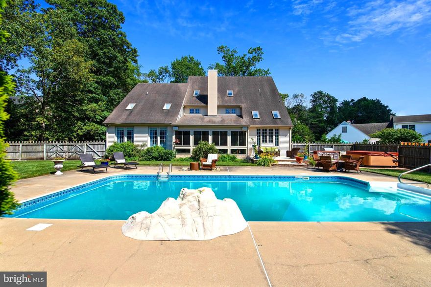 New Price! Just reduced $20,000 for quick sale!  SMARTEST HOME ON THE BLOCK!!!  Gorgeous 4 BR, 2.5 BA, with 2 additional bonus rooms, Amazing back yard with in-ground salt water pool,  hot tub, multiple outdoor entertaining areas, patios, granite Fire & Ice table, 2nd paver fire pit / sitting area  & large shed.  This home features state of the art Smart Home systems integrating home security, lighting, thermostats, cameras, intercom, speakers  and so much more through a single app.  The options are endless with this system.   Stunning new kitchen will be the envy of all your friends! Gleaming white shaker cabinets, quartz counters, 18  tile floor, soft close cabinets, dove tail drawers, spice drawer, cutlery drawer, Induction cooktop,  touchless  faucet, built in wine refrigerator, 2 wall ovens (one is convection), lighted glass upper cabinets, stylish under cabinet lights and toe kick lights at floor level, can create any mood you imagine! Enjoy the sunny casual dining area under the skylights and overlooking the back yard.  Kitchen is open to the great room with 28'  soaring ceilings, skylights &  gas fireplace.  The show stopper of this home is not just the dream kitchen and back yard, but also its   Florida Style  where the indoors are integrated with the outdoors by centering the home around the incredible brick enclosed porch and pool area with doors opening all around.  Four sets of French doors provide access from the kitchen, great room and master bedroom to the enclosed porch where you will spend countless hours all year! With ample seating space, guest refrigerator, 2 ceiling fans for summer and electric fireplace for winter you might never go inside!  There is even a convenient doggy door and ramp for pet lovers.  The first floor also features a formal dining room, and formal living room (flexible living space - could be office or extra bedroom), half bathroom, audio/visual/security closet, and laundry room.  1st floor master bedroom will impress with vaulted ceilings, tons of windows,  walk in closet with upgraded organizers, beautiful master bathroom with jacuzzi tub, separate shower and unique 2nd vanity area.  1st floor is all tile and hardwood floors.  Upstairs the style continues with the open balcony overlook with access to 3 additional bedrooms, a hall bath featuring tile floor, new vanity, and tub/shower combo.  At the end of the hall you enter the oversized 2nd floor family room, with an additional work out / bonus room off of it., Huge unfinished 3rd floor with walk up steps gives more than enough room to expand living space or use as storage!   Pool features a salt system, cleaning robot, cover, rock style waterfall, and diving board which was uninstalled but will be left for new owners.  Backyard is fenced in and a dream for entertaining and vacationing at home!  Sq Footage does not include 21 x 11.5  enclosed porch with heated fireplace or unfinished 3rd floor. Bonus features are attached garage with incredibly tall ceilings, commercial grade water treatments system which even treats the irrigation, new windows, storm door, and shutters on the front, electric hookup present for landscape lighting, seller is including everything you need outside to start the party including the fire/table, grilling station and hot tub!  Pool was just fully serviced and opened for the season, all equipment will convey. Save time, money and heartache with the Home inspection and Septic Inspection already completed and available.