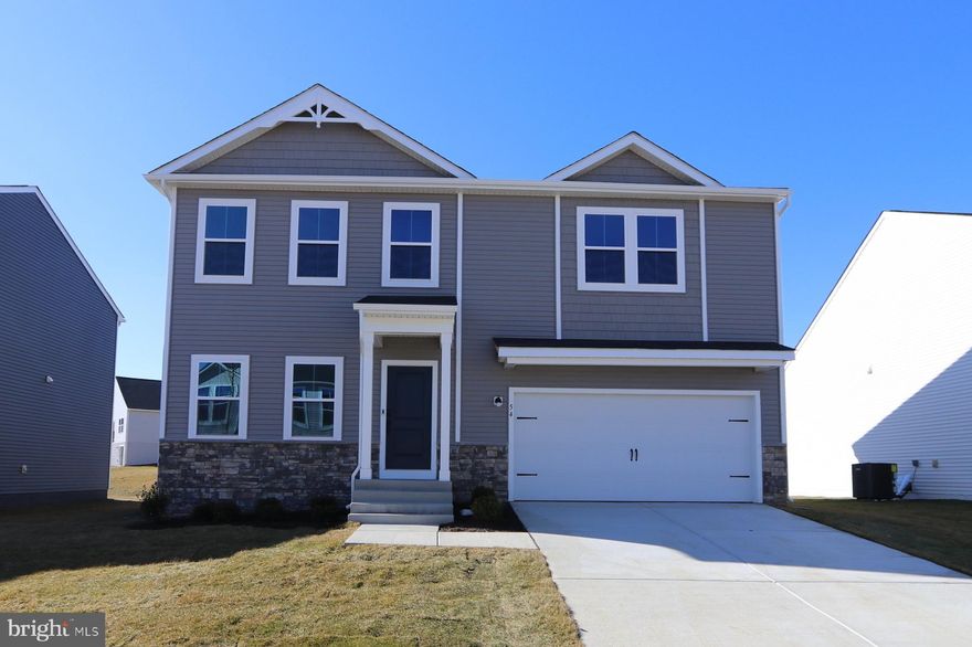 To Be Built – September 2025 Move-In at Liberty Run!
Fall in love with the Water Lily—a thoughtfully designed home that blends style, space, and smart living in one stunning package. Located just over the Jefferson County line in Berkeley County, Liberty Run offers the ideal location for NOVA/DC commuters seeking peace, convenience, and value.

This 5-bedroom, 3-bath home is packed with upgrades and charm, starting with an open-concept main level featuring soaring 9' ceilings, recessed lighting, and wide plank laminate flooring. The kitchen is a true showpiece—quartz countertops, a large center island, white enamel farmhouse sink, ceramic tile backsplash, and upgraded dark-stain farmhouse-style cabinetry. Top it off with upgraded stainless-steel appliances and a double pantry for the perfect blend of function and flair.

A main-level bedroom with full bath offers flexible living options, while the home office creates the perfect remote work setup.

Upstairs, you'll find 4 spacious bedrooms, a full laundry room, second family room/loft, and a show-stopping primary suite with dual oversized walk-in closets and a spa-style bath with a frameless walk-in shower and double vanity.

Need more space? The unfinished basement with L-shaped areaway provides endless potential for future expansion or storage.

This home also includes a stunning  stone watertable, designer chandelier, and today’s most sought-after tech upgrades:  
• Wi-Fi garage door opener  
• Ring video doorbell  
• Kwikset HALO Wi-Fi smart lock
• Leviton Wi-Fi smart switches  
• Upgraded CAT6 + RG6 wiring throughout and more!

Come see why Liberty Run is one of the area’s fastest-growing communities. Schedule your tour of the beautifully decorated *Water Lily* model today and ask about our limited-time buyer incentives!

*Photos are of a similar Water Lily model. Taxes are an estimate.*