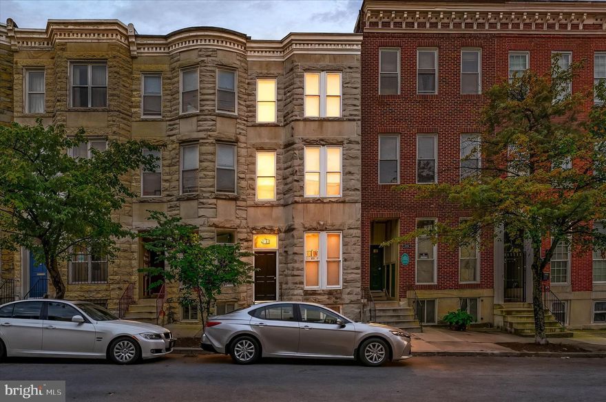 Live in one unit and rent the other—or bring the whole family! Welcome to 221 E Lafayette Avenue, a beautifully maintained two-unit townhouse located in the heart of Greenmount West, one of Baltimore’s most beloved and artistic communities. Whether you’re looking for a home with income potential or space for multi-generational living, this property offers flexibility, comfort, and unbeatable location.

The lower unit spans the entire first floor and finished basement, featuring 3 spacious bedrooms, 2 full bathrooms, a home office, and a large utility room—perfect for working from home or extra storage. The upper unit occupies the second and third floors with another 3 bedrooms, 2 full baths, and its own utility room. Each unit has its own separate entrance and offers abundant natural light, high ceilings, and thoughtful layouts.

You’ll appreciate the practical updates including a 10-year-old roof, HVAC systems and water heaters that are only 5 years old, and fire-rated construction (no fire escape required!). The large rear parking pad provides off-street parking, and there’s typically easy on-street parking for the upper unit as well.

But the real star is the location. Tucked in the center of the Station North Arts & Entertainment District, you’re surrounded by murals, music venues, theaters, studios, cafes, and galleries. Penn Station is just a 5-minute walk away, making commuting to D.C. or New York a breeze via Amtrak, MARC, or Light Rail. You’re also steps from the Purple Line Circulator, city bus routes, and bike lanes—so getting around Baltimore is easy and car-optional.

Nature lovers will appreciate immediate access to the park directly behind the home, several green spaces nearby, and a large, fenced-in dog park just around the corner. Residents love the peaceful, tight-knit feel of Greenmount West—with friendly neighbors and a strong sense of community—while still being close to all the action in Mount Vernon, Charles Village, Remington, and downtown Baltimore.

Whether you're looking to settle down, start fresh, or enjoy city living with extra space and income potential, 221 E Lafayette Ave is a rare opportunity to own a piece of a thriving, creative neighborhood that truly feels like home.