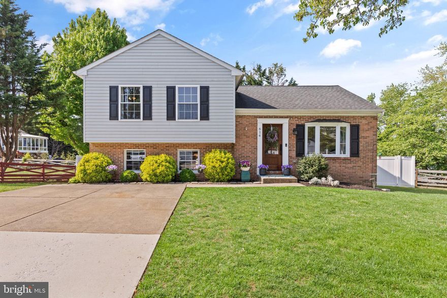 Modern Elegance Meets Comfort in This Stunning Fountain Glen Home

Welcome home to 614 Lanark Ct N. This beautifully updated split-level gem, perfectly situated on a scenic 0.21-acre lot in the sought-after Fountain Glen community. From the moment you step inside, you’ll be captivated by the contemporary finishes and thoughtfully designed layout that make this home truly move-in ready.

The main level boasts an expansive living room bathed in natural light from a striking front-facing bay window, complemented by rich gray-toned wood flooring and stylish recessed lighting. Soaring cathedral ceilings enhance the open, airy feel—perfect for both everyday living and entertaining guests.

At the heart of the home, the sleek, upgraded kitchen features gray cabinetry topped with granite counters, a center island with breakfast bar seating, and black appliances including a gas range. A window above the sink provides a charming backyard view, while the adjoining dining area—complete with chandelier lighting and sliding glass doors—opens to a spacious deck ideal for grilling and outdoor gatherings.

Upstairs, you’ll find three generously sized bedrooms. The primary suite, tucked away at the rear of the home, includes a walk-in closet, ceiling fan, and serene natural light. Two additional bedrooms offer ceiling fans, ample closet space, and easy access to a beautifully remodeled full bathroom featuring elegant tilework and a stylish vanity.

The fully finished lower level offers versatile living space in an L-shaped layout—ideal for a family room, home office, or workout area. It includes recessed lighting, full-size windows, a convenient full bath with walk-in shower,  laundry area, and additional storage. Step outside to a fully fenced backyard surrounded by mature trees, complete with a storage shed and playground equipment—perfect for outdoor enjoyment.

Located just minutes from shopping, dining, top-rated schools, and vibrant Downtown Bel Air, with easy access to I-95 for a smooth commute, this home offers the perfect blend of modern style and everyday convenience.