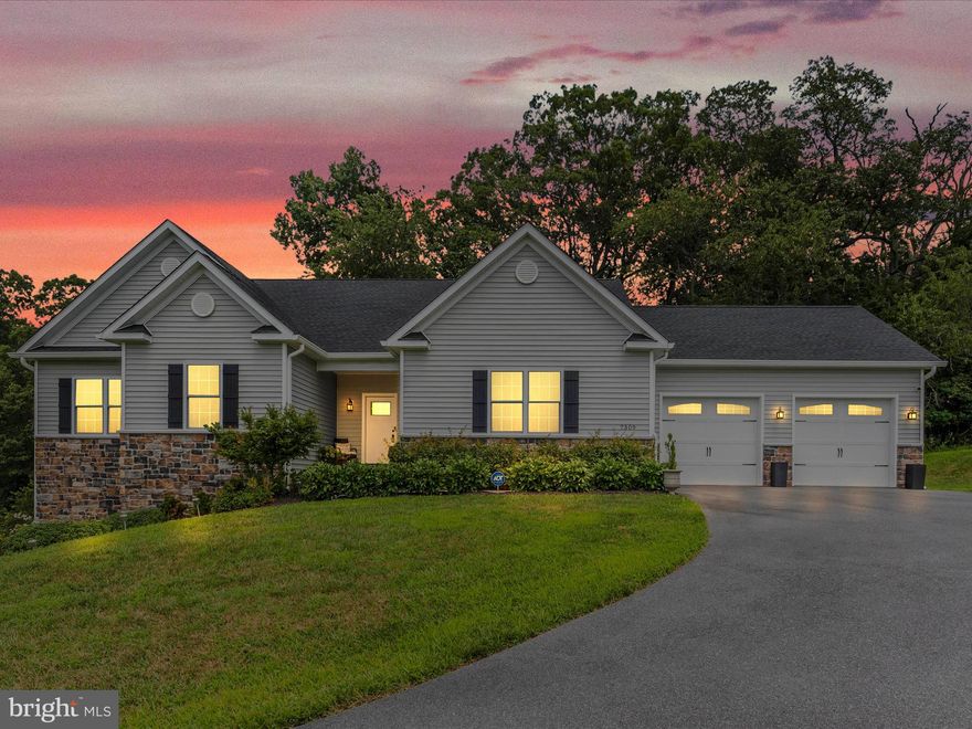 Main Level Living at its finest! Enjoy the scenic setting of this lovely home nestled in the Talbot Ridge Farms subdivision. Only 4 houses on a private road, surrounded by farmland! Built in 2019, this home is like new, and ready for its new owners.  Coming up the recently paved and oversized driveway, you'll find yourself greeted by a lovely walk way, up to a cozy front porch nook. Inside, you're welcomed into a huge open foyer that graciously brings you into the heart of the home. The gorgeous kitchen is open to the breakfast area, and the family room is large enough for a separate dining area, or keep it a big family room, the choice is yours! Kitchen features beautiful taupe-grey cabinets with sleek black hardware, glass subway tile backsplash, a modern separate vent hood over the stove, an enormous island with built in sink and dishwasher, and so much prep space on the marble countertops! Behind the kitchen is a hallway to access the half bath, mudroom with built in bench and shoe cubbies, and the laundry area on the way to the large 2 car garage. Back into the home, head past the family room to find the bedroom wing. The primary suite is down another hall, with an oversized linen closet for convenient storage. The primary suite is built to impress, with recessed lighting in the tray ceilings, sitting/dressing area, a generous walk in closet, and attached primary bathroom with double sinks, it's own linen/storage closet, and a beautiful walk in shower with glass subway tiles. Back out to the main hallway, find 2 more bedrooms which share another spacious full bathroom with a tub/shower combo and double sinks! Heading back into the main area of the home, but tucked out of the way, find the wrap around stairs leading you to the basement, and sunbathed by more windows. The basement was thoughtfully designed to meet a variety of needs. Find a massive finished recreation room with ample recessed lighting, which makes this area feel less like a basement, and more like a fun hang out area. Large enough to separate into gaming area, home theatre, and home gym space! Basement also features another full bonus room, and full bathroom with tub/shower combo. Keep the bonus room as an office, or a space for guests! With the ease of the walk out level and separate door, this could be converted to use as au-pair space, a separate apartment, or even a home based business. The choice is yours! Schedule your tour today, this property is sure to impress!