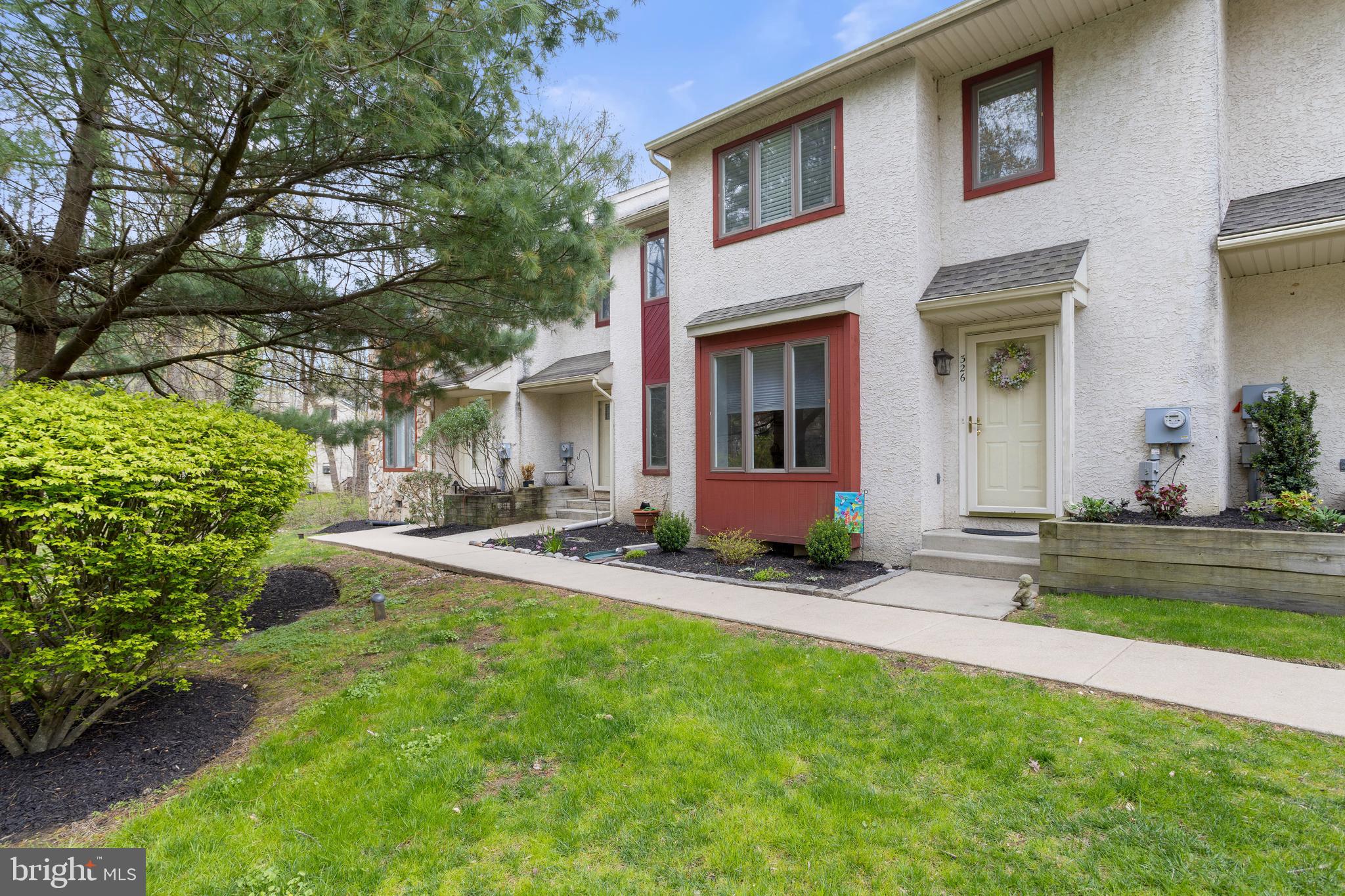 Tucked in a quiet, tree-lined community in top-rated Rose Tree Media School District, this spacious townhome offers comfort, convenience, and privacy.
Step inside to a bright, open layout with a large living room, powder room, and an extended kitchen featuring amble counter-space, an area for dining and lounging by the gas fireplace. Sliders lead to a private rear deck with peaceful wooded views—your own backyard retreat. Upstairs, two oversized en suite bedrooms each offer walk-in closets and full baths. The rear-facing primary suite opens to a private second-story deck—perfect for morning coffee or evening wind-downs. Laundry is conveniently located in the hall. The third floor hosts a third en suite bedroom (yes that’s correct - each bedroom has its own full bathroom!) with walk-in closet, plus hallway access to attic storage. Recent Updates Include: New A/C & heating (2019), Roof replaced (2020), Gutter guards (2021), Dishwasher & fridge (2024), washer/dryer (2023), Fresh paint throughout (2024). BONUS: HOA covers exterior maintenance for easy living. Enjoy proximity to Granite Run shopping, Media’s downtown restaurants, Rocky Run YMCA, Ridley Creek State Park, and more!