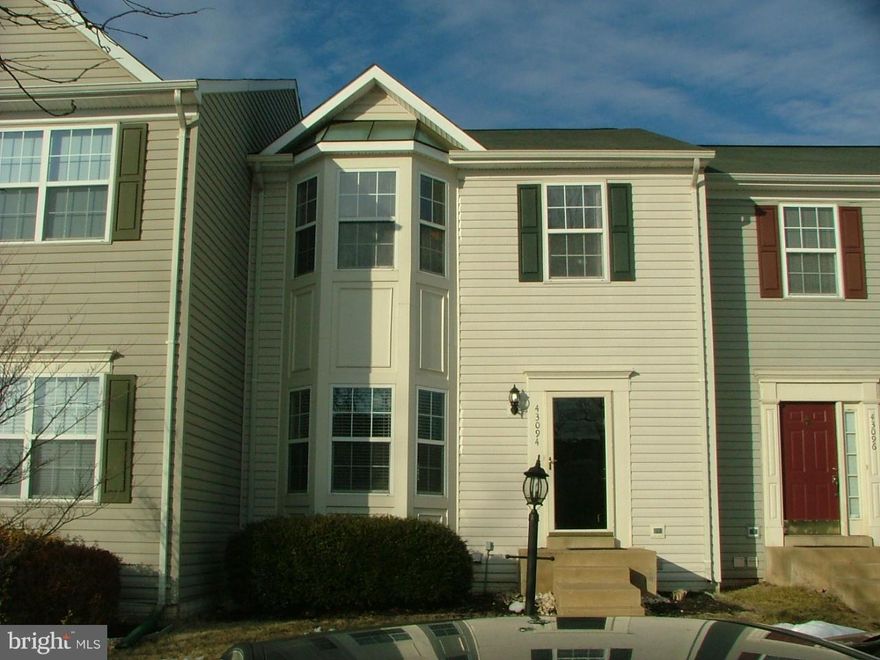 Fabulous 3 BR, 3.5 BA TH w/2400 sq feet! Hardwood floors grace foyer, living & dining rooms. Updated kitchen features stainless steel appliances, gas cooking & new lighting fixtures. Bay window is perfect for a breakfast nook.  New carpet most of the upper level. Fully finished basement offers 2 separate living spaces, full BA & laundry w/new washer. Great outdoor spaces: deck, patio, fenced yard