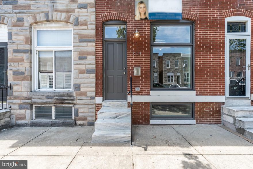 Brand New Renovation with Parking & CHAP Tax Credit by Chance Development!  This completely renovated 3 bed, 3 bath row home has a bright, open floor plan with  modern and historic features.  The home has gleaming hardwoods throughout, custom trim work & painted brick walls .  The kitchen has beautiful white cabinets, stainless steel appliances and a 7 foot island with waterfall quartz countertops.  Spa-like baths with custom tile work and modern accents.  Fully finished basement has bedroom and full bath.  2nd floor rear and rooftop deck are perfect for entertaining!