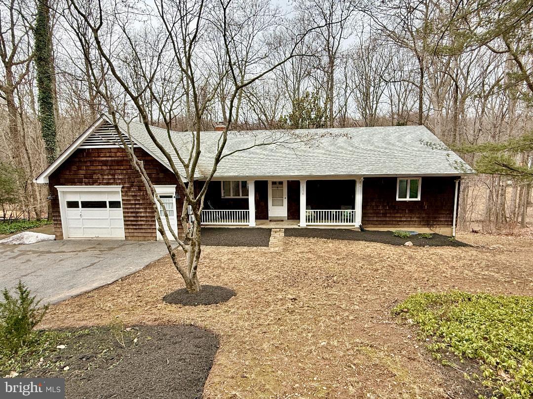 Welcome to this beautifully updated 4 BR, 3 full BA home nestled in a private setting with stunning views of nature and wildlife . Completely updated kitchen w new cabinets, quartz countertops & SS appliances, all three bathrooms fully updated and new vinyl flooring throughout the home. Open concept perfect for entertaining with a beautiful brick fireplace on the main level , crown molding and recessed lighting throughout the home, new lighting fixtures, new AC unit, first floor laundry, a huge screened in patio (with a built-in grill), entire home freshly painted. Oversized garage, basement workshop and storage area and the list goes on. Turnkey home and no details were spared so don't miss out on this opportunity!
