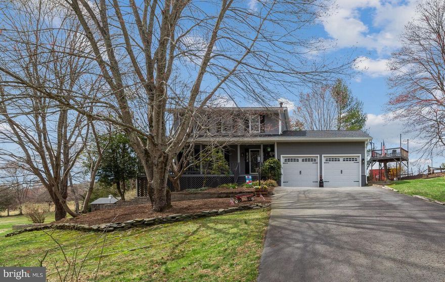 Well, If scenery, peace and tranquility are high on your list - our home with a wraparound porch is it - large enough for your Adirondack chairs, hammock and a swing. Loads of flowering bushes and trees (forsythia, ginco, magnolias), meandering stream, patios, huge covered porch, wrap around deck and pastoral views make this amazing outdoor space so special. You can take in the views while grilling and streaming your favorite show or working from home through Xfinity high-speed internet.  Perched on a slight knoll with a stone retaining wall and walkway to gardens, our home has pastoral views and forested edges with daffodils lining a slow-moving creek running the length of the property. Close enough to DC for a daily commute with plenty of nearby parks, sports facilities, breweries and wineries to balance work with play.  We have a zip line traversing the yard leading to the creek (which can be used as a dog run) . Fenced in raised gardens are ready for Spring Planting. We have a 20 x 10 shed - a great getaway to do wood-working projects.  Also, a lean to shed for firewood or easily changed to house chickens. Our living room, office  and dining room offer hardwood floors, crown molding with loads of natural light. Our remodeled kitchen(2013) has been updated with ebony cabinets with brushed nickel hardware, accenting Granite countertop,  travertine back-splash, center work island, double deep stainless steel sink with a gooseneck faucet and roll out shelving,   Stainless steel appliances - GE Advantum Cafe Convection oven, built in microwave,  touch screen refrigerator, Bosch dishwasher and a built in microwave. We have a breakfast nook with an Anderson sliding glass door to the covered porch offering ceiling fans, a pergola with lights leading to the backyard and to  eagles nest hideout.  There is additional storage under deck.  A perfect place to entertain and enjoy the seasons. The kitchen opens to the family room with vaulted ceilings, brick fireplace hearth, wood burning fireplace and hardwood floors.  The powder room has upgraded cabinetry with drawers, Kohler sink and toilet. The stairs to the upper level are oak with accenting black risers. The upper level has oak hardwood floors throughout. The primary bedroom has a ceiling fan, his and her walk-in closets and a ensuite fully updated bath with newer vanity, granite counter top, newer hardware and an oversized shower with a  decorator ceramic tile surround. The two additional bedrooms are spacious and have ceiling fans and double door closets.  The hall bath has been updated with newer upgraded vanity, granite countertop, fixtures and a ceramic tile bathtub surround. The lower level has a 27 x 13 recreation room with surround sound, full size windows - allowing lots of sunlight in. On this level, we have an exercise room with Anderson sliding glass doors to a concrete patio, storage room and under staircase storage. Additional features and updates- 6 panel doors, new roof, gutters, downspouts(2019), new vinyl siding(2019), out door fans, well pump(2019), new distribution box on 2nd drain field(2019), air scrubber(2016), HVAC system(2013) - service each year, sewer ejector pump(2013), garage doors(2013), ring system and nest, Pergola Sunbrella shade,  garage bike and canoe racks(conveys). Offer deadline is Sunday, March 26th at 8pm.