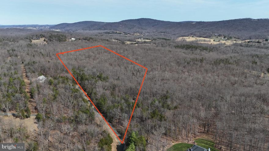 Oh go ahead! You know you’d love more privacy.

Opportunities like this are getting harder to find. Nestled within the Chimney Oaks area of Marshall, this 10-acre wooded parcel offers the rare chance to shape your own vision while enjoying the natural beauty and quiet character that defines Fauquier County. 4-bedroom pec and well location already approved!

Step onto the property and the first thing you notice is the sense of space. Mature trees create a natural canopy and provide a peaceful setting that feels far removed from the noise of everyday life. Sunlight filters through the woods and the landscape offers flexibility for positioning a future homesite—whether you imagine a residence tucked deep into the trees or placed where the light and views open through the forest. At the end of the cul de sac, you will find a trail that takes you along the rest of the property line.

The land sits within the Agriculture District (RA) zoning, allowing for residential use while preserving the open, rural character the area is known for. With ten full acres to work with, there is room to design a custom home that blends with the surrounding landscape—think winding driveways, outdoor living areas, and windows that frame the natural setting in every season.

This property also presents appealing possibilities beyond simply building a home. The wooded acreage and quiet surroundings make it suitable for recreational enjoyment, nature observation, or seasonal hunting. It can also serve as a strategic land investment, offering long-term value in a region where larger parcels continue to attract attention.

Important groundwork has already been completed to help move future plans forward. A well permit is on file, and a septic permit has been issued, giving buyers valuable clarity as they plan development. 

The location adds another layer of appeal. Marshall is known for its scenic countryside, equestrian heritage, wineries, and welcoming small-town atmosphere. At the same time, access to I-66 makes it possible to reach larger employment and commercial hubs without sacrificing the calm of a rural setting.

Whether your vision is a custom country home, a private weekend retreat, or a long-term land investment, this 10-acre Chimney Oaks property offers a compelling canvas to bring that vision to life.

**Pictures with property lines are approximate***