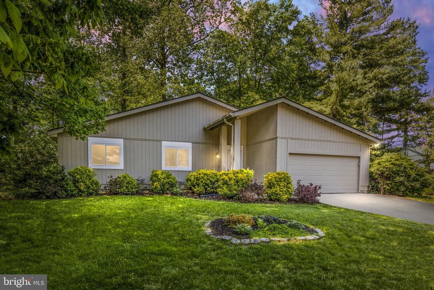 Rarely Available and so hard to find - main level living at its finest - no stairs to deal with unless you want to go down to lower level. Situated at the end of a cul de sac, this 3 bedroom up contemporary boasts of  cathedral ceilings and loads of big windows for natural light. We offer an open floor plan with an updated kitchen with white raised panel cabinetry, a center work  island with a breakfast bar,  a family room and dining room off of the kitchen, and a living room with vaulted ceilings. A perfect floor plan for entertaining family and friends. The primary bedroom has a full bath, a ceiling fan and a walk in closet. There are 2 additional bedrooms on this level with a full bath. The lower level is finished with two dens/offices or could be used as a bedroom (has a closet but not the window built to code),  a recreation room with a wet bar and a storage room with a work bench. All this on a wooded lot on a cul de sac.  Great location - minutes to Dulles Tollway, Dulles Airport, and Reston Town Center with it upscale shops and restaurants. We are 3 Miles to the Silverline Metro. Additional updates double pane windows(2020), Roof(2015), Master Bathroom shower upgrade(2019),  Lower Level Painted and New Carpet(2022). The HVAC system is serviced every 6 months.