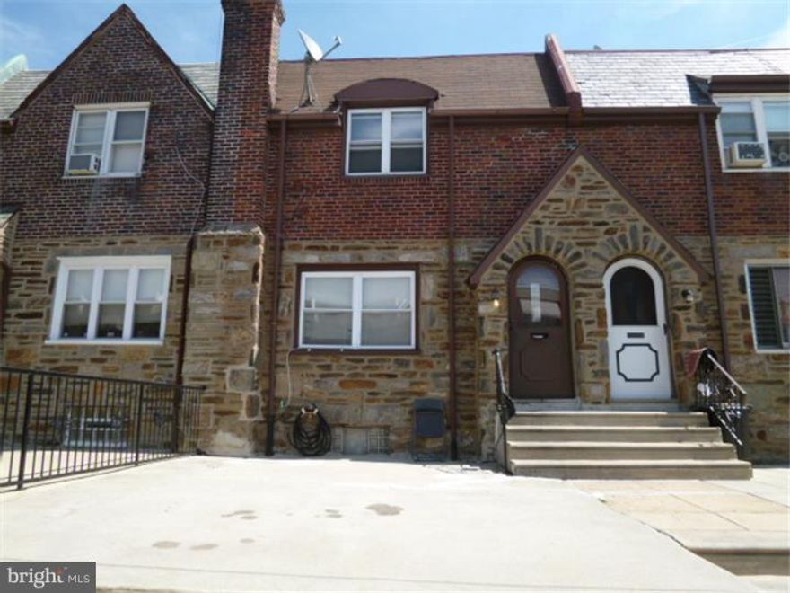This porch front Stone  home is in very good condition, it consists of living room with hardwood floors, dining room with galley kitchen and a laundry area on basement with play area and garage with rear parking. Upstairs you will find 3 nice sized bedrooms all with hardwood floors and a 3 piece bath. $2,000 Certified Funds Deposit and Proof Of Funds, AS IS Addendum Will Be Required And BUYER Will Be Responsible For U&O. Buyer will pay 1005 of transfer tax. ALL OFFERS WILL BE PRESENTED.