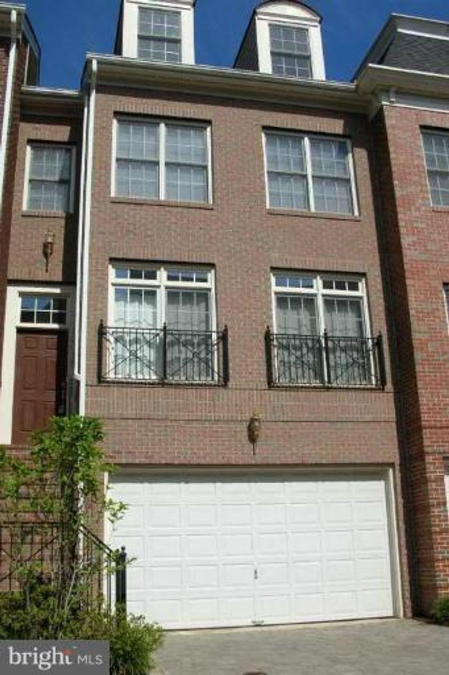 LUXURY FOUR LEVEL TOWNHOUSE IN A GREAT LOCATION. GOURMET KITCHEN WITH GRANITE COUNTERS AND CHERRY CABINETS AND SS APPLIANCES. FAMILY ROOM WITH GORGEOUS GAS FIREPLACE OFF KITCHEN. HARDWOOD FLOORS IN LIVING ROOM THRU FAMILY ROOM. FULLY FINISHED BASEMENT. LOTS OF CLOSETS. HIGH CEILING. GREAT LOFT AREA FOR GUEST ROOM OR OFFICE OR EXERCISE ROOM. NEW CARPET & NEW PAINT.