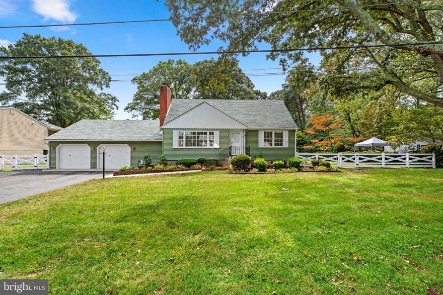 Upgrades galore are found in this pristine Cape Cod in Cape St. Claire featuring rich hardwoods, striking dentil crown moldings, wood shutters, a sunfilled living room centered by a wood burning fireplace, and a well trimmed dining room with a glass slider stepping to a cool and comfy deck and down to a patio.
The cook's kitchen offers Corian® counters, complementing tile backsplash with inlays, raised panel white cabinetry, crisp white appliances, and breakfast table space with pendant lighting.
On the main level you find two bedrooms and one bath, upstairs two more bedrooms with crafted built-ins, dormer architecture, and a full bath. A nice bonus is the finished lower level highlighted by a wood burning fireplace with a brick surround in the rec room, a laundry room, extra storage, and a walk-up accessing the garage to a walkout to the fenced backyard. Community amenities include a beach, boat launches, crabbing pier and dock, pool membership available, playground, soccer fields, tennis courts,
water and lake privileges, and a block from the Little Magothy River.