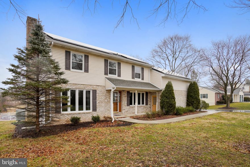 THIS IS A VACANT PROPERTY AND IS COMPLETELY AVAILABLE FOR IN-PERSON SHOWINGS.   What an INCREDIBLE property!  Move right into to over 3,200 finished square feet situated on almost an acre of level yard. This brick-front colonial has a 2-car, side-load garage, 4 BRs, 2.5 BAs, and a large bonus room above the garage giving you in-law possibilities! All New Carpet Upstairs.  Off the kitchen is a windows-galore patio where you can sit and enjoy the view. Relax in the family room in front of your wood-burning fireplace with new flooring throughout much of the main level. The partially finished lower level gives you plenty of room for fun, but also ample storage. You can walk right out to your picturesque backyard to enjoy the pool and wrap-around deck. Create your own garden because the greenhouse conveys! And if green energy savings is on your list, this property already has solar panels installed to help you save big time. Buyer will assume solar panel lease as part of the purchase.  Hard to find all this potential in Sykesville at this price!