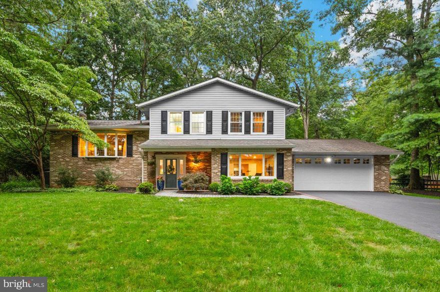 You will know your home the moment you see the address stamped on the driveway.  Pull up to this gorgeous split-level home, perfectly situated on a partially wooded 1-acre lot. The ground floor offers a large family room, a half bath, an office/bonus room, and an incredible four-seasons room. This stunning sunroom features built-ins, a tile floor, a wood cathedral ceiling, 3 sliding doors and four large skylights. The first level offers a living room with a gas fireplace, a dining room, and a newly remodeled kitchen with maple cabinets, quartz countertops, a beautiful backsplash, and new stainless steel appliances. The second level features the primary bedroom with a newly renovated bathroom, two additional bedrooms, and another full bathroom. The basement houses the laundry room with a mop sink, new washer and dryer, and a walk-out to the backyard. The backyard is fully fenced, professionally landscaped, and features a Trex deck,  gas firepit, brick retaining walls, and a patio area to enjoy the park-like setting.  This home comes with a whole house generator, furnace humidifier, radon system and central vacuum.   The property is rounded out  27x23 garage (new door) and  a 20x12 shed to house your lawn equipment. 
 Enjoy the privacy of the wooded lot while still being close to amenities like shopping, dining, and parks in Mt. Airy and Eldersburg.