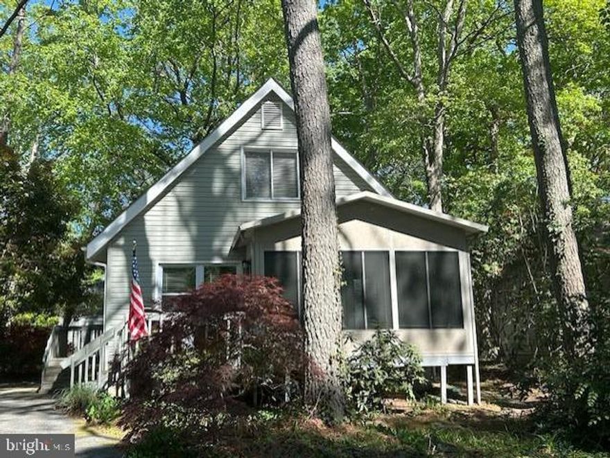 7 IS YOUR LUCKY NUMBER! Updated and ready for your immediate occupancy, this Coastal contemporary 2 story home has everything you want and more. Gracious and welcoming Living Room invites you into the spacious kitchen with updates and dining area.  Primary bedroom with a half bath is on the 1st floor plus another bedroom for guest or family. 3rd or 4th bedrooms or a Family room and office area on the 2nd floor is waiting for you to decide how you want to enjoy it. One has balcony access for quiet nights to spend relaxing. 1 more bedroom on the 2nd floor so everyone has space to live or visit. Delightful Sunroom plus deck at the front of the home. Detached shed for lawn, bikes and beach toys.
Easy to see so come and fall in love.