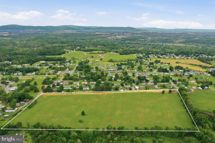 23 acres prime for development!  Water and sewer on the property and access from two paved roads; one on each side of the parcel.  Last picture shows additional 5+/- acres available to purchase with Williamsport Pike frontage: MLS #: WVBE2050812. Location: Large open field at the end of Murphy lane and Judy dr.