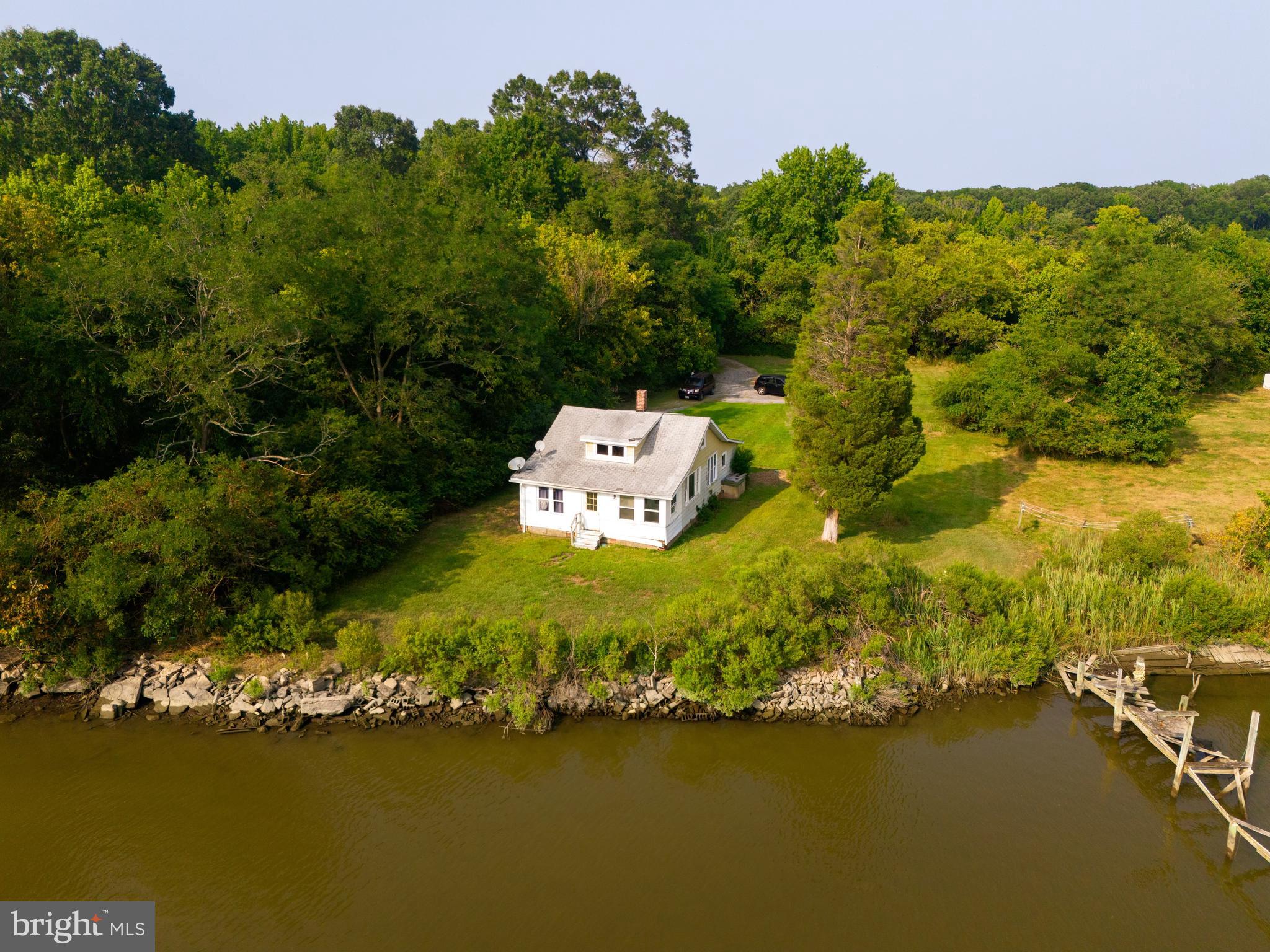Price Reduction!!
Your Own Private Retreat, get away from the Rat Race and make this a great place for you and your family.
1337 West River Road , located in Shady Side, MD
is a secluded waterfront property that sits on 1.5 acres with 592 feet of waterfront on the South Creek.
This property has a home with 2 beds and 1 bath that will need remodeling and/or teardown.
it's located 1/4 mile off the main road (West River Road ) follow signs to property. use GPS
(once on West River Road make a left turn pass the first house on the left and follow gravel road to the end.)