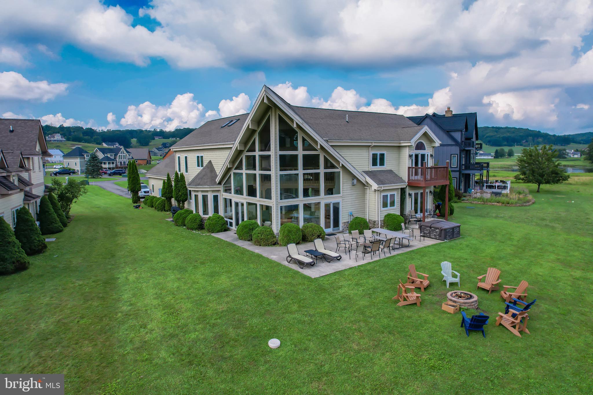 HOME AWAY FROM HOME – Stunning Lindal Cedar Home on Deep Creek Lake
Welcome to "Home Away From Home" – a breathtaking Lindal Cedar home nestled right at the water’s edge of Deep Creek Lake. This exceptional lakefront property is a rare find, offering the perfect blend of luxury, comfort, and adventure.
* Three Spacious Master Bedrooms
* Expansive Custom Windows with Uninterrupted Lake Views
* Open Floor Plan with Soaring Beamed Ceilings
*Includes Dock Slip – Just Steps to the Water
*Oversized 2-Car Garage
Currently operating as a successful vacation rental, this home is available fully furnished and turn-key – ready for you to enjoy or continue as an income-producing property.
Located in a unique, amenity-rich community, enjoy:
Par-3, 9-Hole Golf Course
Mini Golf & Clubhouse Access
Tennis Courts
Fishing Pond & Walking Paths
Private, Peaceful Setting Just 15 Minutes from Wisp Resort
Whether you're looking for a full-time residence, a second home, or an investment opportunity, this property delivers it all – stunning architecture, unbeatable lakefront access, and endless recreation year-round.
Shown by Appointment Only – Don’t Miss This Rare Opportunity!