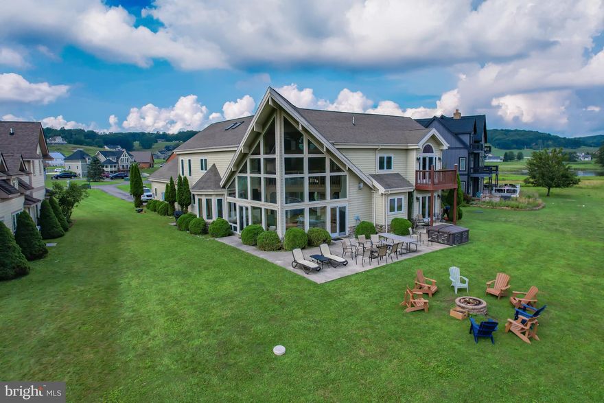 HOME AWAY FROM HOME – Stunning Lindal Cedar Home on Deep Creek Lake

Welcome to "Home Away From Home" – a breathtaking Lindal Cedar home nestled right at the water’s edge of Deep Creek Lake. This exceptional lakefront property is a rare find, offering the perfect blend of luxury, comfort, and adventure.

* Three Spacious Master Bedrooms
* Expansive Custom Windows with Uninterrupted Lake Views
* Open Floor Plan with Soaring Beamed Ceilings
*Includes Dock Slip – Just Steps to the Water
*Oversized 2-Car Garage

Currently operating as a successful vacation rental, this home is available fully furnished and turn-key – ready for you to enjoy or continue as an income-producing property.

Located in a unique, amenity-rich community, enjoy:

Par-3, 9-Hole Golf Course
Mini Golf & Clubhouse Access
Tennis Courts
Fishing Pond & Walking Paths
Private, Peaceful Setting Just 15 Minutes from Wisp Resort
Whether you're looking for a full-time residence, a second home, or an investment opportunity, this property delivers it all – stunning architecture, unbeatable lakefront access, and endless recreation year-round.

Shown by Appointment Only – Don’t Miss This Rare Opportunity!