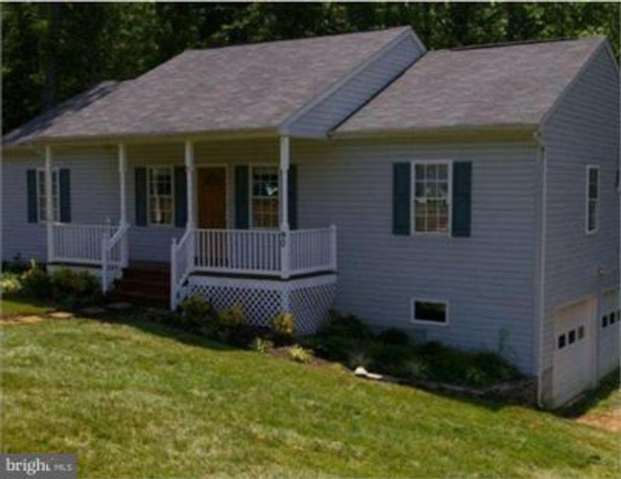 Gorgeous 5 bedroom, 3 bath home on 3.5 private acres! This home features hardwood floors, large eat-in kitchen, finished basement and a side load 2 car garage.  Minutes to Quantico, I-95 and VRE. We are Pet Friendly.  Showings by Appointment Only.  Credit Check Required!  Apply Today!