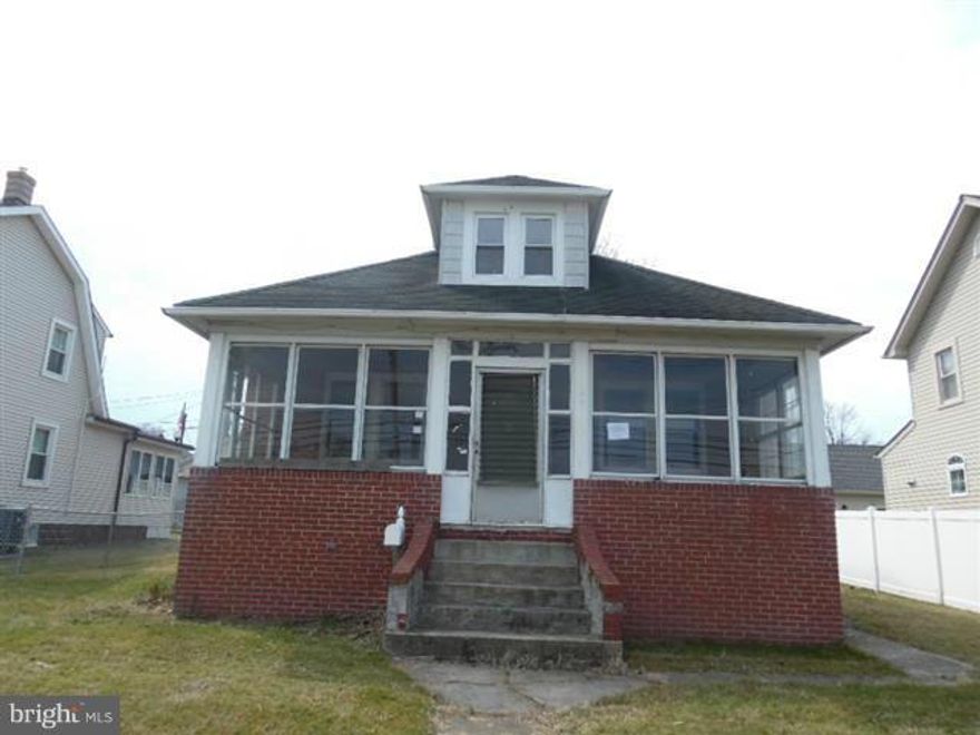 Spacious Cape Cod in Edgemere features Enclosed front , rear and side porches. Partially fenced rear yard with detached 2 car garage. Two bedrooms on main level with full bath. Formal L.R. & D.R. and huge country kitchen.Upper level has 2 nice size bedrooms with play area or library .Full lower level with laundry and flush. Close to schools and shopping. Easy access to Key Bridge & 695.