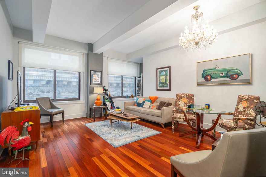 NOW AVAILABLE at the Ellington - a unique opportunity to own a 1,001 SF unit on the 18th floor! This 1 bedroom, 2 bath, turn-key apartment includes hard-wood floors throughout, an open floor layout, and tons of natural light. A second, full bath is conveniently located near the entry foyer, and acts as the perfect powder room for guests. The spacious primary suite includes another full, marble bathroom and luxurious walk-in closet. This spectacular condominium is located in one of Philadelphia's premiere neighborhoods just steps from the city's finest museums and galleries, superb restaurants and the infamous, Rittenhouse Square. The property offers concierge, 24-hour doorman, a fully equipped fitness center, club room and discount valet parking garage located next door to the building.