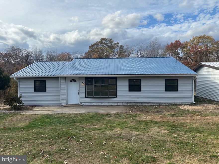Are you looking for a great starter home!? Then look no further! This home has been extensively renovated with modern conveniences and touches in mind! This rancher in southern Morgan County is a 3 bed 1 bath. This is single level living at its finest! This home has all new vinyl siding, windows, roof, and plumbing. New carpet in all 3 bedrooms  and LVP throughout the rest of the home. New appliances in the brand new kitchen! Property has a great flat yard and a 12x15 storage shed. Located about 1/2 of a mile from the VA line this home is great for commuters to the Winchester and Northern VA area with the WV living experience. Motivated seller! Bring your offers!