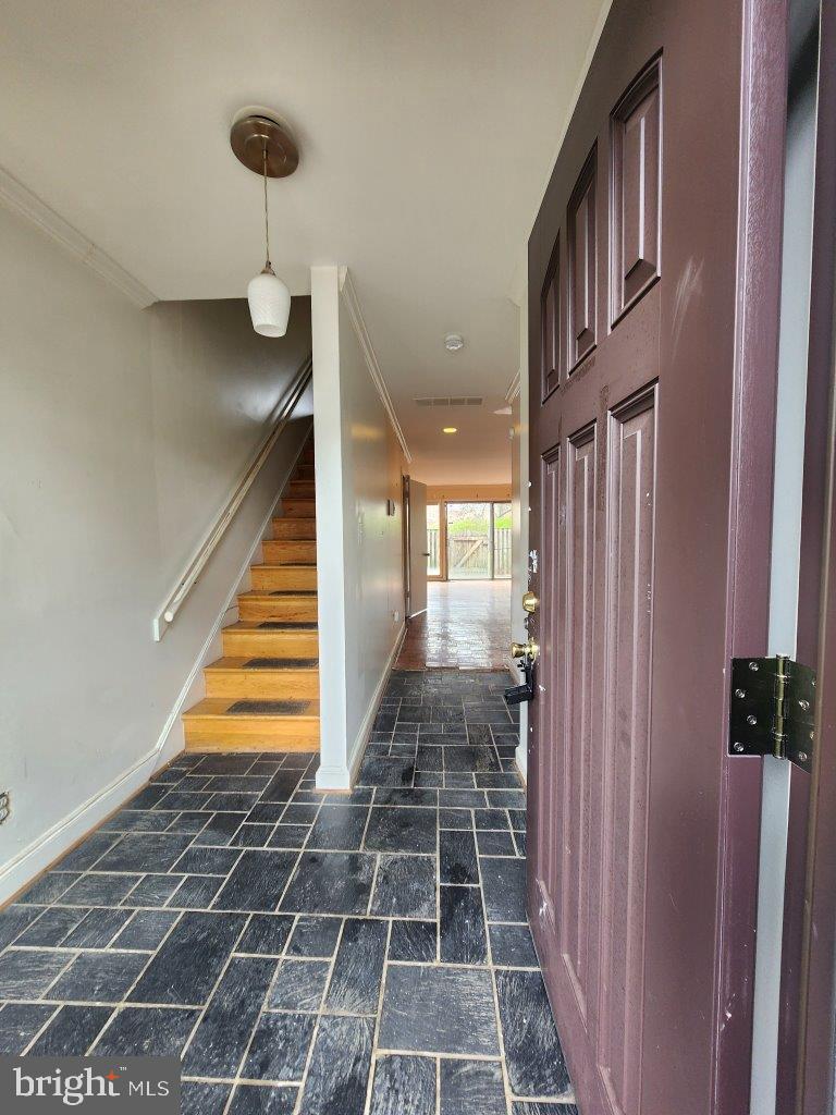 Great price for this 2 level 2 bedroom home in the charming Park Village community! Ideal for first time homebuyers or a savvy investor looking for an inexpensive home to add to their portfolio. This home is ideal for those seeking to make their own upgrades. As you enter, be greeted by the spacious foyer that leads you to a large open dining area overlooking a spacious living area with brick fireplace and a sliders that leads to the back fenced patio - the large outdoor space will be a perfect getaway for you and your guests to relax, unwind and enjoy the sunshine or evening break. The main level space provides ample space for spending quality time with family and friends. Envision an opened kitchen which also features a slider and a view to your own private patio and view to your front parking space. Laundry is conveniently located on this level but can easily be moved to the upper level. Upstairs you will find 2 very spacious bedrooms and 2 full baths along with the utility room. Enjoy the great natural light from every room, adding to the beauty of this townhome. This home is conveniently located near numerous shopping, dining, and entertainment options, making it the perfect choice for anyone who wants to enjoy the best of what this area has to offer. Don't miss out on your chance to make this exquisite townhome your own. Schedule a viewing today!