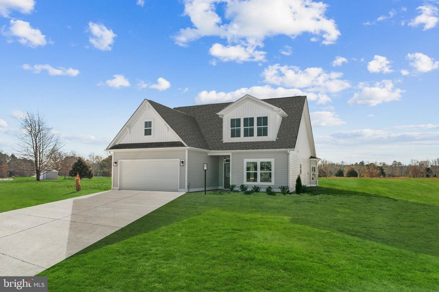 TO BE BUILT – Welcome to Hobbs Hole Section II! Located in the charming Rappahannock River town of Tappahannock, Hobbs Hole Section II is the area’s newest community featuring level lots with optional golf course views. Built by RCI Builders, homes in this section offer slab construction and convenient single-level living—ideal for those looking to eliminate stairs. Featured is the Bell Creek model, offering 2 bedrooms, 2 full bathrooms, and a spacious two-car garage with paved driveway. The open-concept design connects the kitchen, dining area, and family room, with an optional vaulted ceiling to enhance the airy feel. The kitchen features a large island, stainless steel appliances, and a walk-in pantry. The first-floor Owner’s Suite includes a private bath with dual vanities, a large tiled shower, and a generous walk-in closet. Looking for more space? Choose the optional second-floor upgrade to add a third bedroom, an additional full bathroom, and unfinished storage—perfect for guests or future needs. Enjoy the outdoors with covered front and rear porches, creating additional spaces to relax and unwind. Photos shown are from the Bell Creek model in RCI’s Kennington community and are for illustrative purposes only.