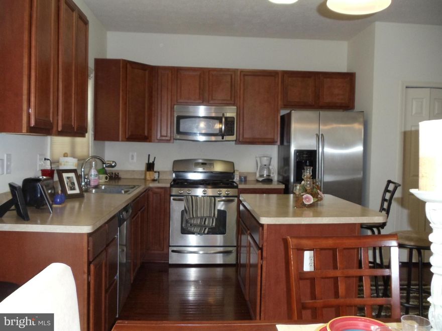 BEAUTIFUL, ALMOST NEW 3 BEDROOM 2 FULL AND 2 HALF BATHS, OPEN TOWNHOUSE LOCATED ON RT 1, CLOSE TO FBI, QUANTICO, FRONT AND BACK GATE , 610 AND I-95, LOTS OF  WINDOWS, LARGE KITCHEN WITH ISLAND,  MASTER WITH SEPARATE SHOWER AND SOAKING TUB WALK-IN CLOSETS, FULLY FINISHED WALK OUT BASEMENT HE WASHER AND DRYER, GARAGE AND TWO PARKING SPACES