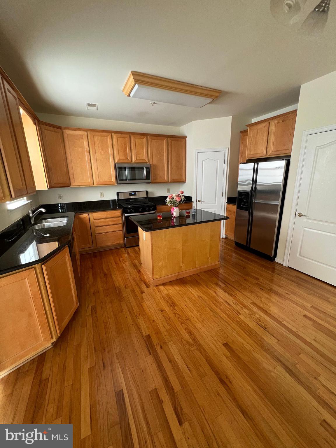 REDUCED Again, Come and get it while its hot. This spacious and lovingly maintained 5-bedroom, 3.5-bath home is perfect for a growing family ready to settle into comfort and community. The owner is ready to sell to a family looking for more than just a house—this is a place to truly call home. almost 4000 sq. ft. and finished basement, ideal for family movie nights, a playroom, home gym, or multigenerational living. The main level features gleaming refinished hardwood floors, brand new carpet, fresh paint, and a bright, open-concept layout with a 2-story family room and cozy gas fireplace. The kitchen includes stainless steel appliances and flows into a formal dining room with a tray ceiling—perfect for Sunday dinners and holiday gatherings. The oversized primary suite offers a walk-in closet and double-vanity bathroom. Step outside to a large fenced-in backyard with a deck made for relaxing and entertaining. Conveniently located near shopping, dining, and major commuter routes like Route 5, Route 301, and the Beltway. Weekend showings only, 11 AM–6 PM—contact the listing agent to schedule your private tour today and take the next step toward your American dream.
