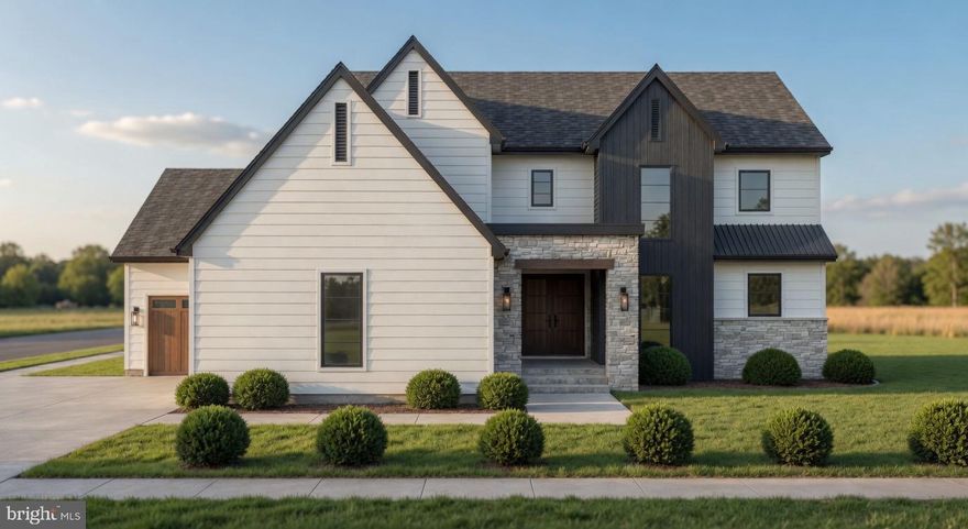 Welcome to the newest statement residence in the exclusive Moncure subdivision — a thoughtfully designed custom home where timeless architecture meets modern luxury in the heart of the City of Fredericksburg. Built by Madi Built, this exceptional new construction offering blends refined craftsmanship, elevated design, and everyday livability in one unforgettable package.

Designed for both elegant entertaining and comfortable daily living, the main level showcases a stunning two-story great room, expansive windows, and an open-concept layout filled with natural light. The chef-inspired kitchen anchors the home with a large center island, walk-in pantry, dedicated office nook, mudroom with built-ins, and seamless flow into the dining and living spaces. A spacious covered rear patio extends the living experience outdoors for year-round enjoyment.

The main-level primary suite offers a luxurious private retreat with a spa-style bath, oversized walk-in closet, soaking tub, separate shower, dual vanities, and direct access to a thoughtfully designed laundry area. Every detail was curated with convenience and sophistication in mind.

Upstairs, four additional bedrooms provide flexibility for guests, multigenerational living, fitness, hobbies, or work-from-home needs. The second level also features multiple full baths, generous storage, and open views overlooking the dramatic great room below.

Architecturally striking from every angle, the exterior combines clean modern farmhouse lines with rich textures, bold rooflines, and upscale curb appeal rarely found in new construction today. Dual garages, covered outdoor living spaces, and carefully planned design elements create a home that feels both impressive and welcoming.

Located within the boutique Moncure subdivision, this home offers a rare opportunity to own newly built luxury in one of Fredericksburg’s most desirable emerging communities — moments from downtown Fredericksburg, the VRE, parks, dining, shopping, and major commuter routes.

This is more than a home — it is a signature property designed to stand apart.
