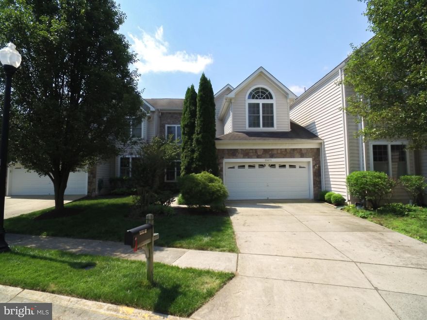 You will love the privacy this home has compared to all others! Backs to Golf Course/Common area, Inviting Casual, yet sophisticate, entertaining areas uniting rich with utter comfort! Wood Floors, High Ceilings, Moldings, Master Suite plus 3 additional BDRMS. Sun-splashed Kitchen, Family Rms. Lower Level Office with Wood Floor, Exercise area, and Bonus RM.  Enjoy inviting, Private,Trek Deck for alfresco entertaining overlooks GOLF COURSE views.