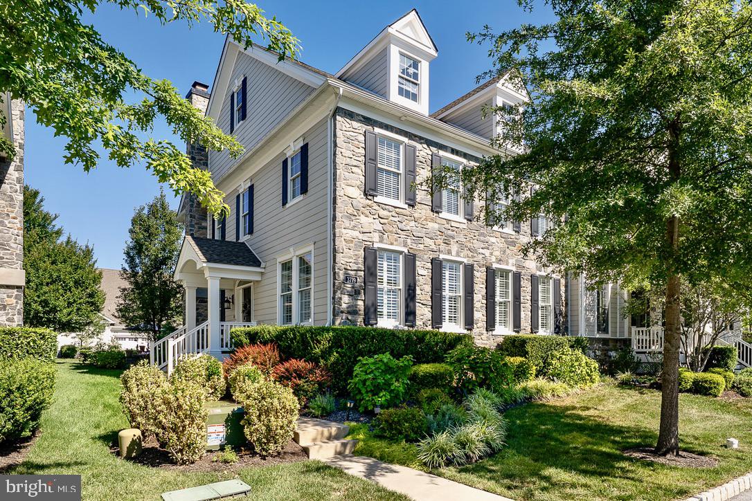 Welcome to this outstanding end unit townhome located in The Village neighborhood of Liseter. It is elegantly appointed and upgraded with high quality materials, and one of the few homes that boasts a secluded and delightful patio, thoughtfully designed to create a garden oasis rarely found in a townhome community. Enclosed with a knee wall, highlighted by indirect lighting, and surrounded by luscious bushes, flowers and small trees, this garden patio is perfect for daytime or evening relaxation. It is connected to the home via a raised deck and gas grill, with permanent gas line connection. The stone presentation facing the quiet street allows for a covered front porch and side entry front door which opens into a two story foyer and curved staircase. Windows on three sides of this well designed home allow for wonderful natural light to flow throughout the main floor. The rooms flow gracefully in this open floor plan design as the Foyer opens into the Great Room and then into the chef's kitchen. The inviting Living Room is bright and open, and features plantation shutters, a fireplace with contemporary design and traditional mantel, hardwood floors an recessed lighting. This room adjoins the gorgeous Kitchen with stunning granite island, Bosch Gas cooktop, Subzero refrigerator, Miele dishwasher, Moen "touchless" faucet, and contemporary pendant lighting. The Butler's Pantry with wine refrigerator connects the Kitchen to the Dining Room, a lovely room with elegant tray ceiling and plantation shutters. The spacious Office enjoys a more private location, away from the open flow of the main floor. Of special note throughout the main floor are the plantation shutters, the hand scraped wood floors, and recessed LED lights. The updated Powder Room and large coat closet complete the central part of the main floor, while the Laundry facility provides access to the garage, the patio and the stairs leading to the Bonus Room which is currently serving as a woodworking shop. This room offers hardwood floors and a mini split system for individual temperature control. Returning to the Foyer, the staircase with wood floor leads to an open hallway with balcony overlook, and the hardwood floors continue into the Primary Suite which boasts a vaulted ceiling and a custom deisgned large walk in closet organized by California Closet Systems. Double doors open into the primary Bath with two separate vanities wih marble tops, a soaking tub, and large walk in shower. Two additional Bedrooms, each with Califonia closet systems, and a Hall Bath with double sinks and tub/shower combination, complete the second floor. The finished Lower Level offers a family room with luxury vinyl plank flooring, a Fitness room and a half Bath. The 2 car garage enters from Parlo Mews, and has direct access into the house. In addition to all the special features of this home, its excellent placement in the larger community provides for easy access to all the amenities that Liseter offers - The Barn, sports facilities, the pool, walking trails, the community center and much more. This outstanding home is uniquely designed to meet every need and to provide a lifestyle in this well planned community, located in close proximity to wonderful shopping, dining and recreational activities. Don't miss the opportunity to make this lifestyle. your very own! Showings begin on Wednesday, Sept. 3rd.