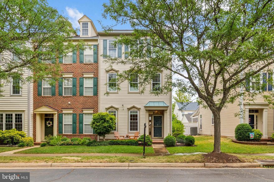 Rarely Available ‘Regents’ End Unit Model in South Riding!

Very well-maintained 3 level, 3BR, 2 1/2 Bath end-unit TH with a detached garage off a private back patio.  Enter the home directly on the main living area - no long staircase to get groceries to the kitchen!!  The main level features 10 ft ceilings, a flexible space for a dining room, office, study, or other use just off the foyer, and a half bath.  An open floorplan showcases a kitchen with granite counters, 42” cabinets, slide out lower cabinets, a gas range, and a large granite island adjacent to the family room and fireplace.  The A/V cabinet over the fireplace, wired for speakers, is ready for your flat screen. Walk out this level to a private patio, (fenced with a back gate) that is steps away from the detached 2-car garage. The large garage storage loft is accessible by pull-down steps, and has partial flooring for tons of storage.  On the second level you will find an expansive primary suite with double closets, and a completely updated primary bath (2023), featuring a jetted tub, all new fixtures, and porcelain tile.  A loft/flex room that could be used as a, nursery, office, or craft room, and the very convenient laundry area complete the 2nd level. The top (3rd) level has 2 bedrooms ideal for family/guest rooms or dedicated office space for working at home  and a connecting jack and jill bath (updated 2023).  A comfortable rec room area, currently set up as a media room with  space for a large TV, AV equipment shelving, and wired for surround sound speakers is also on this level. The home is fully wired for Fios. Numerous updates and upgrades will provide MANY years of minimal maintenance and energy-efficient utilities. The ‘BIG TICKET’ items are DONE! These include roof on the house and the garage (2017); all exterior wood trim is aluminum wrapped (2017); ALL windows replaced, (2022) including cellular shades (dual bottom/up and top down); HVAC (2022). New Clothes Dryer. A Navian Tankless Water Heater (2022) offers the option of heat using either the gas furnace or the Navian system for energy efficient heating and savings on energy bills!  In-ground sprinkling systems for lawn and plant beds (2022) surround the house, and mulched areas converted to river rock (2022) make this an easy living home. Well located in sought after South Riding, on a tree lined street offering a lovely wooded front view with plenty of parking for guests. Enjoy the many amenities of the South Riding community including the Dulles South Community Center offering so many opportunities for year-round swimming, fitness, fun, and community activities.