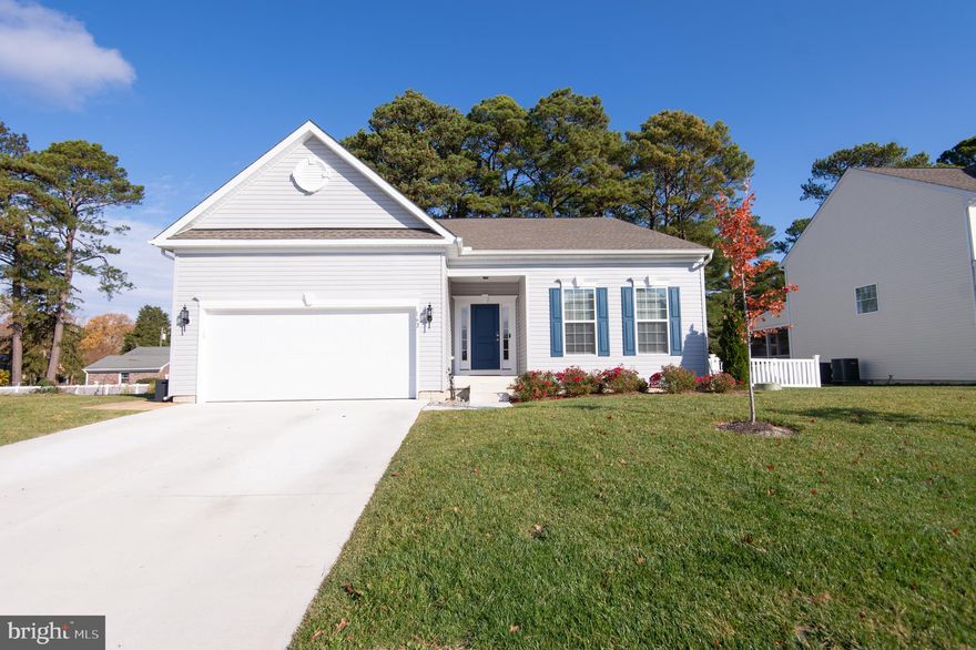 **Price Improvement Do Not Miss this Lovely Home** Come fall in love with this two-year-old Long Boat Estates home brimming with stunning upgrades! Experience an elegant open floor plan perfect for entertainment, encompassing a lavish kitchen equipped with granite counters, stainless steel appliances, recessed lighting, and upgraded cabinetry. Delight in the comfort of a main level primary suite featuring a dual sink vanity, walk-in closets and a luxury jetted tub. Venture upstairs to discover a cozy den/family room, an additional bedroom and a full bath. Unwind on the serene screened porch/deck, surrounded by a beautifully manicured and solar-lit fenced backyard. For those with hobbies, the garage offers ample space and a comfortable climate-controlled environment. A verdant sodded yard is equipped with an irrigation system, ensuring a beautiful exterior year-round. Nestled in the inviting Long Boat Estates community with an affordable HOA, amenities include a community pool, boat ramp and two piers. Take advantage of this beautiful property and make it your new home today