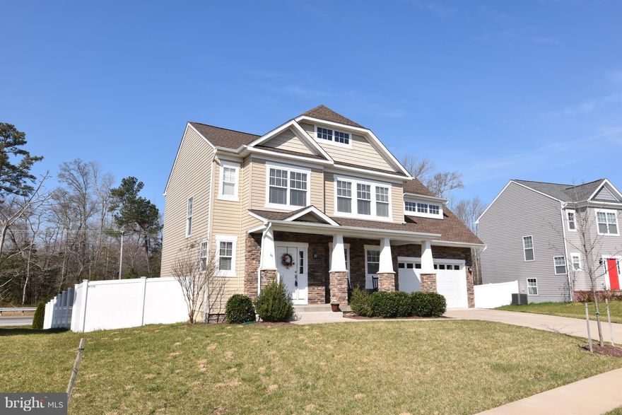 Beautiful Stone front colonial with 3 finished levels. Kitchen has granite counter tops, upgraded appliances & cabinets with hardwood floors. Basement is fully finished with full bath and storage area. 4 bedrooms upstairs with tray ceilings in the master bedroom. Soaking tub in the master bath with double vanities. Deck and fenced in back yard already completed for you.