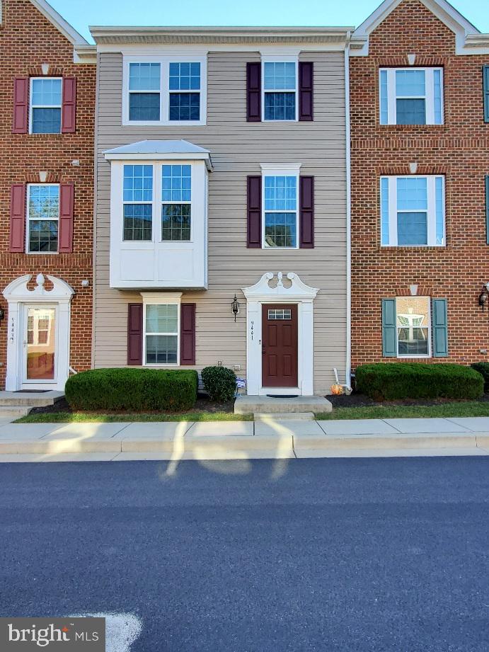 Welcome to 4 bedroom, 3 Full bath, 1 Half bath townhome featuring high end stainless appliances, granite countertops, huge island with granite counter-top, 10ft ceilings & 42" espresso wood cabinetry with hutch, morning room drenched in natural light. Relax/entertain on deck. The master suite offers a tray ceiling, large walk in closet & private luxury bath w/ double sinks, huge soaking tub & oversized tiled shower. 2-car garage, Study/library or possible 4th bedroom, storage room and full bathroom at lower level. Perfectly located within walking distance from a new Costco store, shopping and restaurants. Commuter friendly, close to I-795 and metro station. (Qualification Requirement: Credit Score: 675+, Income: $108,000+).