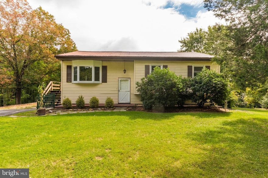 Wow! Completely redone home on a private 3.2 acres. Home has a brand new HVAC system and hot water heater. Home features a beautiful new kitchen with new cabinets, stainless steel appliances and granite counter tops. New floors and new Paint throughout home. New faucets, fixtures, toilets.......too much too list.