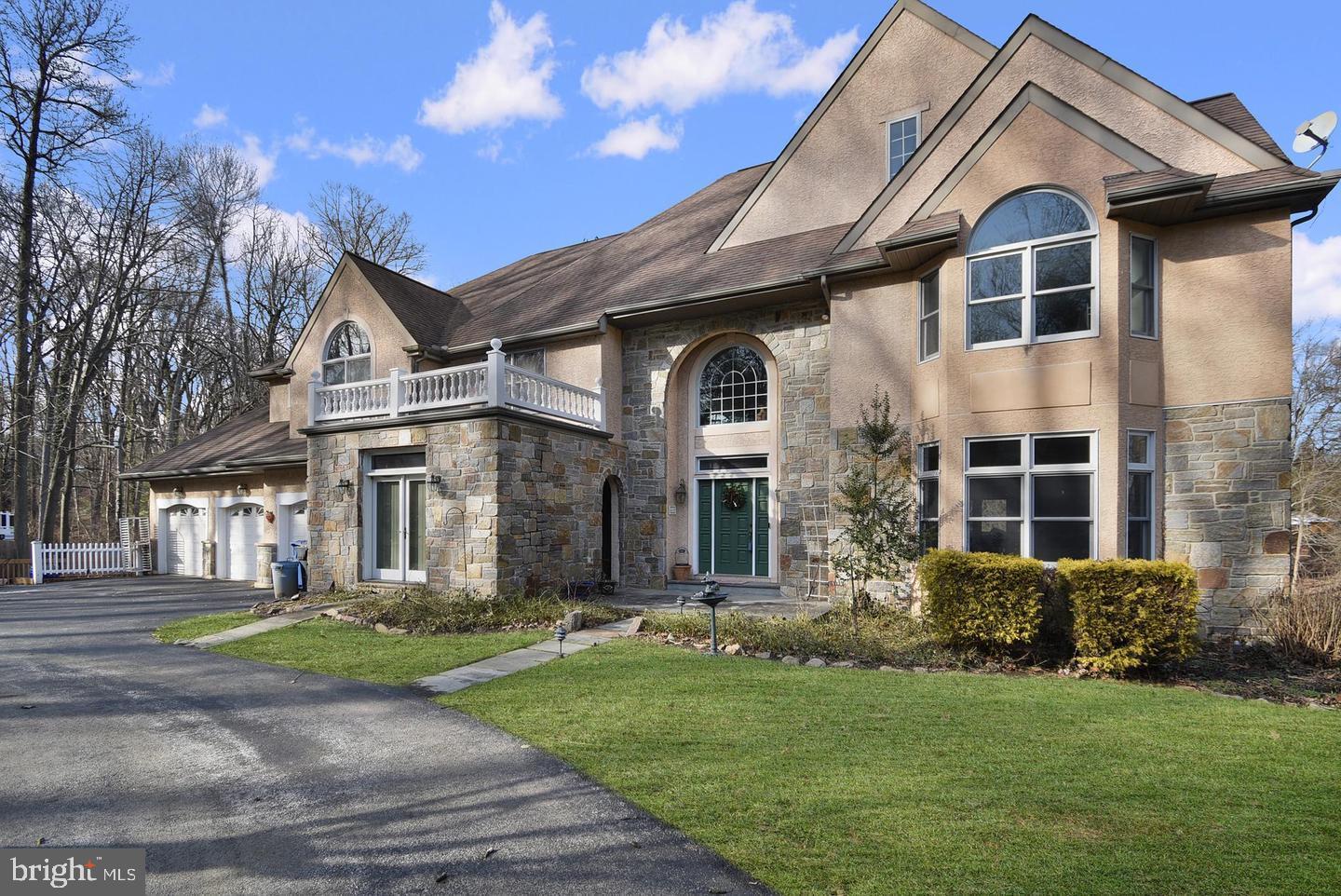 MUST SEE !!! , THE SELLER HAS NOW FIXED,UPGRADED AND INSTALLED AND REPLACED MANY THINGS SINCE TAKING OVER , SO IT LOOKS MUCH BETTER THAN BEFORE .This magnificent home is on a beautiful two-acre lot with mature trees and a spring-fed pond! Situated at the end of a private drive in Wallingford School District, 411 Marie Drive boasts a grand entryway with vaulted ceiling.Beautiful 2 story foyer w/chandelier that lowers for cleaning. A house that feels so natural around the house. Formal LR/DR w/hardwood floors. DR has propane FP. offering nearly 7,000 square feet of luxurious living space with lovely water views from multiple decks and patio. The entire home was just professionally painted, and the two story foyer sets the tone of what's to come while being the epitome of comfort and style, with its impressive staircase, multiple archways and timeless wrought iron railings. Down two steps from the foyer is the light and bright formal living room, which is located right next to the dining room, which features a fireplace and access to the rear deck. . Large Tuscan style kitchen w/granite island, eating area, walk in pantry, access to deck. Grand family room w/28' beamed ceiling, stone fireplace to ceiling, French doors lead to deck.. Home office has separate entrance for privacy. Back staircase leads you to open area for entertaining. Impressive MB has sitting room, deck and 2 story walk in closet. 3 additional BR's on 2nd flr, each has own bathroom. Amazing LL w/sep entrance complete with full kitchen, LR, BR, laundry and gym room. Perfect for an out of town guest or as an in law suite.There is a lake behind the house, so you can ride a small boat in the summer and it feels so cool and nice. The lower level walk-out basement is nearly 100% finished, and offers a large rec room, wet bar, and full in-law suite, complete with kitchen and full bath. The unfinished portion of the basement has plenty of storage space, and double doors leading to the back yard. The rear deck wraps around the entire back of the home, and offers magnificent water views of the zero maintenance spring-fed pond, with its beautiful water lilies and a variety of aquatic wildlife that will keep you engaged for hours. Prestigious Wallingford-Swarthmore School District and Nether Providence Township, steps to the Leiper-Smedley Trail, and minutes to Baltimore Pike and I-476. Immerse yourself in the beauty of nature while still having all the amenities, conveniences and location of a modern, suburban home.The whole house and the surroundings feel very natural. a great out door view , Moving along the back of the house is the heart of the home, the over-sized gourmet kitchen, complete with recessed lighting, large island, double oven and gas cook-top, custom cabinetry, the perfect mix of granite and tile countertops, and an eat-in area with sliding glass door to the rear deck. Just off the kitchen is the great room, with its 28 foot ceilings, floor to ceiling stone fireplace, ceiling fan, back staircase, wall of windows, and access to the rear deck. A den next to the great room is outfitted with a ceiling fan, built-ins, and access to the rear deck.Three additional bedrooms grace this level each with their own ceramic tiled bath. The lower level houses a potential in-law suite w/its own entrance. Convenient to walking trails, Art Center, the rich cultural center of Swarthmore College campus, shopping, train to Center City and major routes to the Main Line & airport, A powder room, spacious walk-in pantry, laundry area, inside access to the 3-car garage and a full office complete the main floor. Upstairs, the master suite offers a deck of its own, a separate nursery room, a two-story walk-in closet, and a bathroom with bidet, walk-in shower, jetted tub, double vanity sink, and make-up desk. Three more bedrooms, each with their own en-suite full bath, and a loft overlooking the great room complete the upper floor. A rear deck wraps around the main floor. SEE !!