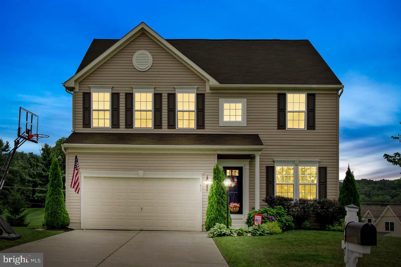 Back on the Market ! This impeccably kept home is located in the desirable Russet Farms neighborhood. Excellent location, minutes to I83 and MD/PA line for commuters. Spacious open concept family room with fireplace and beautiful hardwood throughout the first floor. Large composite deck great for entertaining. Master suite with luxurious bathroom. Fully finished basement with a walk out. Very inviting landscaped yard. Like new and move in ready! Back on Market after new buyers job fell through. The home was inspected and can be passed on to you, an immediate savings.