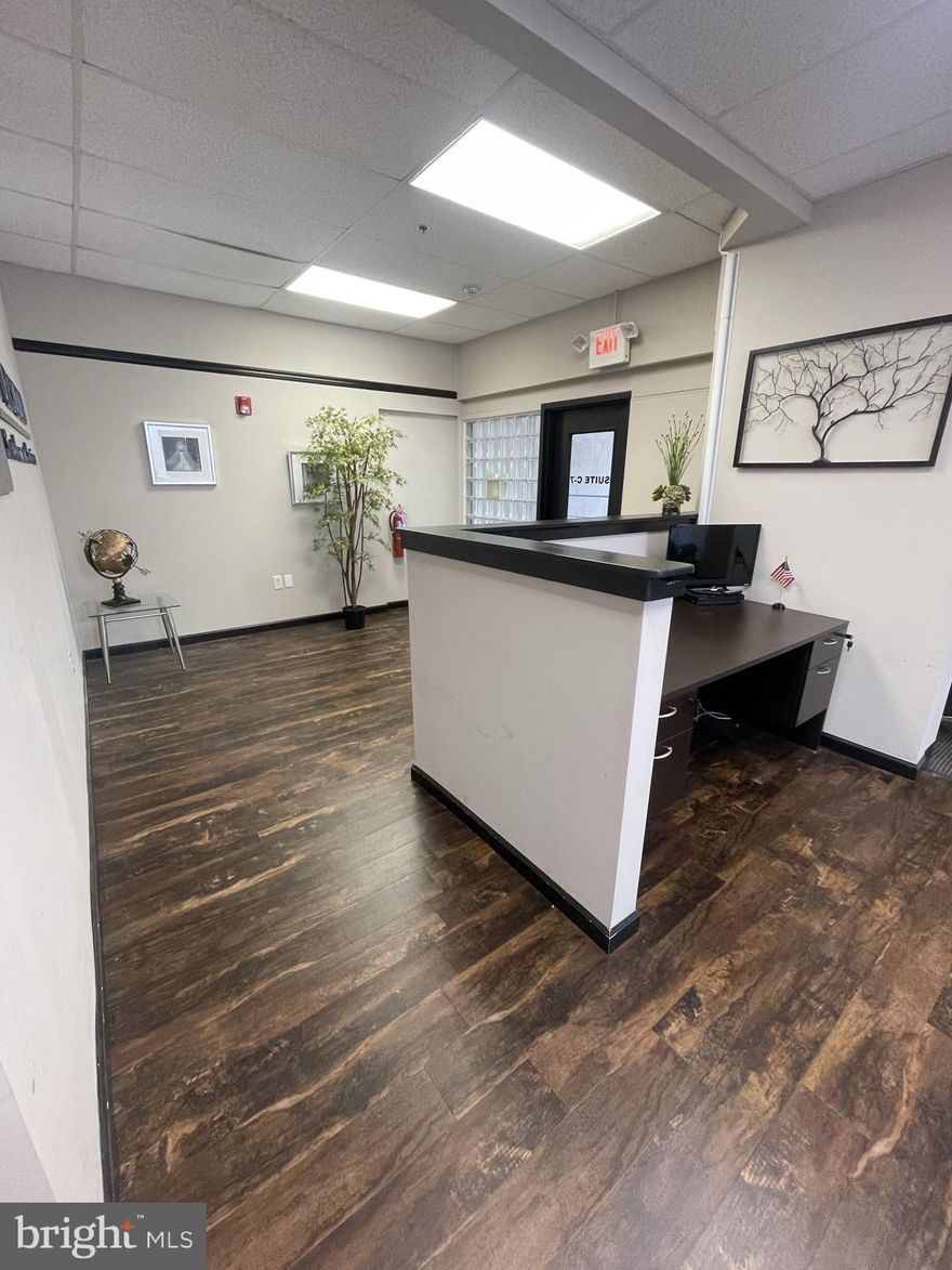 Prime office space available for lease! Located in the Bucks County Office Center, Unit D-7 is an 2,566 sq. ft. office space offered at $4,500/month, with the option to include utilities for an additional $2/sq. ft. The office is well-appointed and the furniture and equipment (as pictured) can be negotiated in the lease, making it move-in ready for your business needs.

This modern office features a welcoming reception as soon as you enter that would also be perfect as a waiting room. Directly to the left of the reception area is a large common room with cubicles and  a spacious closet with shelves perfect for storing equipment. Behind the reception desk, you will find a glass-enclosed room perfect for meetings. Additionally, this office features three private offices, a kitchenette, and two private restrooms.

The building boasts abundant free parking, a serene courtyard, and an on-site gym, offering added convenience and amenities. Ideally situated just off I-95 at Exit 40, this location provides easy access for clients and employees alike.

To be considered, tenants must obtain an approved Use & Occupancy (U&O) permit from the township and carry valid insurance. 

Contact us today to schedule a tour and see how this versatile office space can support your business goals!