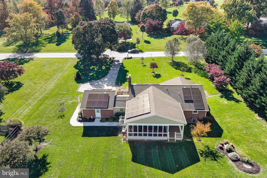 Located in a desirable Baltimore County neighborhood offering the perfect blend of privacy and convenience.  This custom built Rancher sits on nearly 1 acre and is not just a home; it's a lifestyle.   The open floor plan with modern conveniences was created when the home was completely renovated in 2015. All systems and appliances are 8 years old or newer. Attention to  detail is evident throughout...gorgeous hardwood floors, gourmet kitchen, expansive windows, nicely appointed bathrooms & an AMAZING screened porch flanking the rear of the home.  The Owner converted a breezeway to garage into a beautiful  & conveniently located mudroom & laundry room.  The lower level is completely finished offering multi-use space for many different living scenarios. The configuration is currently set up as a guest room/office, full bath, spacious recreation room,  hobby nook &  large utility/storage area. LL offers a large closet with laundry hookup & utility tub.  Several windows and a rear exit door with stairs offer natural light. As you step outside, you'll be captivated by the expansive lush grass that surrounds the home. Imagine hosting gatherings in the screened porch while enjoying outdoor activities.  The possibilities are endless with so much space at your disposal. And the location offers many conveniences with great proximity to amenities, parks, shopping, schools & major roadways including I83/695. Property offers some handicap amenities including grab bars in shower & ramp in garage which can be easily removed . Solar panels were added in 2019 as a move towards a "greener" environment. Solar information is available in Bright.
