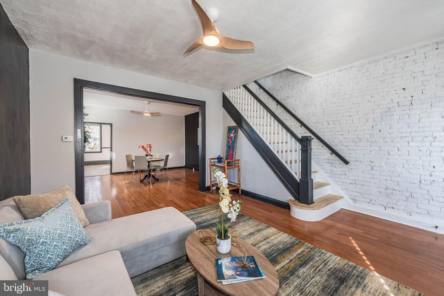 INCREDIBLE OPPORTUNITY TO OWN THIS NEWLY UPDATED END OF GROUP ROWHOME WITH ALMOST 2,000 SQ. FT. OF LIVING SPACE & 2 CAR PARKING!  Welcome to this charming home featuring a spacious living room and a separate dining room, perfect for entertaining. The island kitchen is a chef's dream, boasting ample cabinet space and stunning granite countertops. Enjoy the enclosed front porch, ideal for relaxing with a morning coffee. The upper level offers three comfortable bedrooms and a full bath. The finished basement expands your living space with a cozy family room, a versatile office, another full bath, and a laundry/storage area. Outside, you'll find a rear patio for outdoor gatherings and convenient two-car parking. Don’t miss the opportunity to make this lovely home yours! Great location - steps from Johns Hopkins Bayview and the new Yard 56 development!
