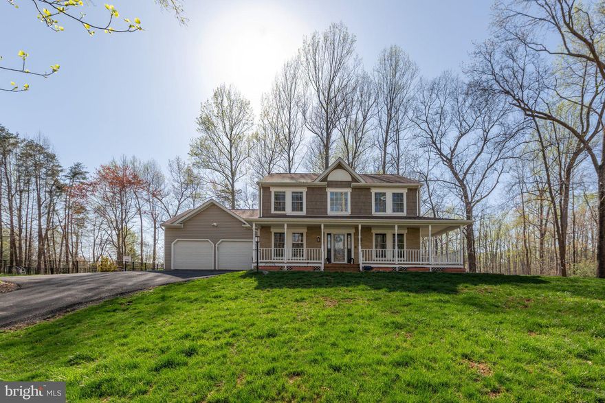 Private Retreat in Harwill Acres at 153 Harwill Drive in Stafford County.   

Nestled on over 3  acres of partially wooded land in the sought-after Harwill Acres subdivision, this stunning home offers unmatched privacy and serenity. A picturesque setting welcomes you with a sprawling wrap around front porch.

Fresh paint throughout this home adds a neutral backdrop for your decor. Step inside to a beautiful center foyer, with refinished wood floors, flanked by a versatile living room or home office on the right and an elegant dining room on the left. The gourmet kitchen is a chef's dream, featuring a striking copper hood vent, brand-new gas stove, stainless steel appliances, a custom backsplash, and a bright breakfast area with charming banquette seating. A large pantry and a garage-entry mudroom provide ample space to customize to your needs.

The inviting family room is bathed in natural light, showcasing a lovely fireplace and custom ceramic floors that add warmth and character. A French door leads to the expansive screened porch, spanning the entire length of the home—an ideal spot for entertaining or relaxing. Step outside to a private oasis, complete with a walkway leading to your own pool and sport court.

Upstairs, the spacious primary suite boasts a remodeled en-suite bath with sliding barn doors and rustic elegance. Large windows on both corners offer treetop views, creating a tranquil retreat. Three additional generous sized bedrooms share a well-appointed hall bath, all providing spectacular views of the secluded lot.

The lower level is designed for recreation and relaxation, featuring a Rec Room with a built-in bar, wainscoting and accent wallpaper perfect for game nights or entertaining.  An exercise room with rubber mat flooring and a set of French doors opens to the side yard. A renovated full bath is located on the lower level with a walk-in shower, perfect for rinsing off after a workout or a dip in the pool. Additional storage and a utility room ensure organization and convenience.

Outdoor living is just as impressive, with a lush green front yard, a massive wrap-around porch, a fire pit, two play structures, an in-ground pool, a lighted sport court and a partially fenced backyard—all enveloped by mature trees for ultimate privacy. The long driveway offers abundant parking, complementing the front-load two-car garage. A convenient storage shed keeps tools and outdoor essentials neatly tucked away. If you've been dreaming of space, style, and endless fun, this is THE ONE. 

Stafford County, Virginia, located between Washington, D.C., and Richmond, boasts a growing population, a business-friendly environment, and a focus on preserving natural and historical resources, while also offering a variety of recreational opportunities and a good quality of life

This exceptional property is a rare gem, combining modern updates with rustic charm, abundant space, and breathtaking surroundings. Don't miss your chance to call 153 Harwill Acres home!