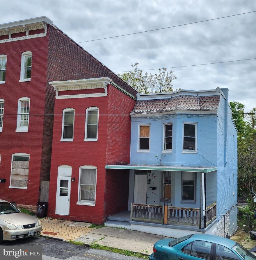 Looking for a reasoable priced all brick city townhom nesttled  in Moutain Side Maryland? Cumberland boasts of rich history and outdoor adventure.  Check out this 2-3 bedroom, one bath 2 story home, some supplies included to finish projects already started.  With home inventory shortages, this could be your change to get into ownership as a primary or short/long term rental.  Bring your dreams and make it your own.  Being sold "as is".