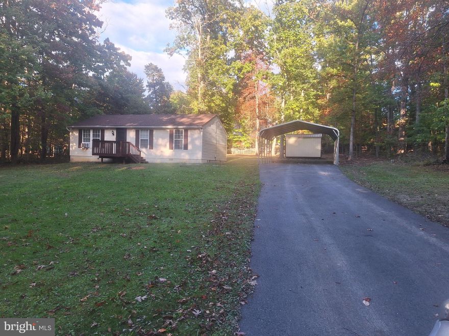 Great Gate 1 location for this affordable 3 Bedroom 2 bath rancher, recently painted and ready for you..
Asphalt drive leads to carport with easy access to home. This would make a great low maintenance retirement home or first time buyer, with 24x8 rear deck, recent roof, 12x8 storage shed, Xfinity available. Come see!.