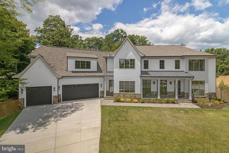 Located on a private cul-de-sac, this new construction by CR Custom Homes offers a well-balanced blend of classic design and modern function. Set on a 0.41-acre lot, this home features 7 bedrooms, 7 full bathrooms, 2 half bathrooms and approximately 9,695 square feet of finished living space across three levels, designed to meet the needs of a busy household.

The exterior includes a stone and Hardiplank facade, a flagstone front porch, architectural shingles and designer lighting. A three-car garage is equipped with Clopay doors, automatic openers with camera and battery backup and the front and back yards feature a full irrigation system and professional landscaping. Oversized gutters and round downspouts complete the thoughtful exterior detailing.

Inside, an open staircase anchors the two-story foyer, with character-grade white oak engineered hardwood flooring . Finishes throughout include solid wood doors, custom trim work, designer lighting, dual staircase to all three levels, and custom closets. The home is prepped for future installation of an elevator, with stacked closets currently in place.

The main level is designed for both everyday living and entertaining, offering a formal dining room, private study with fireplace and custom built-ins, and an open family room with fireplace that connects to a screened porch with a third fireplace. The kitchen includes custom frameless cabinetry, Quartz countertops, a large island with prep sink, premium appliances, two dishwashers, and a built-in microwave. A walk-in pantry with space for a second prep kitchen, and an additional butler’s prep area with sink, and a mudroom with built-in cubbies add to the home’s functionality. A main level bedroom/office with full bath provides flexible living options.

Upstairs, the spacious primary suite includes a large dressing area, dual walk-in closets, and a spa-like bathroom with double vanities, soaking tub, oversized shower, and heated floors. Four additional bedrooms each have en-suite bathrooms and ample closets. A central loft area and a full laundry room with cabinetry and sink round out the upper level. The lower level includes a recreation room with wet bar, exercise room, bedroom with full bath, multiple storage rooms, and a 10’ ceiling flex space perfect for a golf simulator, home theater, or wine cellar.

Built with energy efficiency in mind, the home features 3 Carrier High Efficiency, Multi-Zone HVAC Units with Nest Thermostats, spray foam insulation, R-19 wall insulation, R-49 attic insulation, bronze finish Anderson casement and fixed windows, and LED recessed lighting. Cat 6 wiring is installed throughout.

Located just minutes from top-rated public and private schools, parks, commuter routes, and all the amenities McLean has to offer, this home perfectly blends elegance, comfort, and convenience.