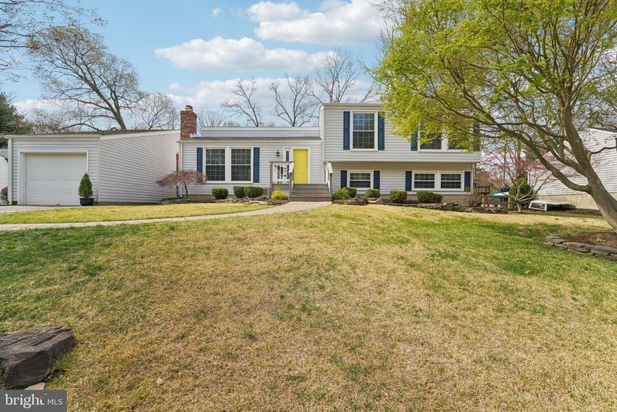 Step into this gorgeous split-level single-family home, where natural light and modern design come together seamlessly. The welcoming entry level is drenched in sunlight, featuring an open-concept living area that's perfect for both relaxing and entertaining.   The beautiful wood floors flow seamlessly throughout this level, creating a warm and inviting ambiance, while the gas-burning fireplace offers the perfect spot to cozy up on cool evenings. The kitchen is a chef’s dream, complete with stainless steel appliances, abundant counter space, and plenty of cabinets for all your essentials. Relax and unwind in the sunroom, offering temperature control and large windows to let in the light and beauty of the outdoors. Updated and beautifully finished throughout, this home offers everything you need. The upper level features three cozy bedrooms with new hardwood floors and two full baths, perfect for rest and relaxation. The lower level surprises with a spacious bedroom, half bath, and a kitchenette area with a sink, countertop, cabinets and wine or beer fridge. This entire area could also act as an en-suite area or bring your creative visions to life! There is also a 4th floor which provides plenty of additional storage space. With an attached one-car garage, additional driveway parking, and access to nearby amenities, this home truly has it all. Enjoy the Bay Hills HOA community, which offers a pool, recreation facilities, playground, and tennis courts. Don’t miss your chance to own this gorgeous split-level gem—schedule your showing today!