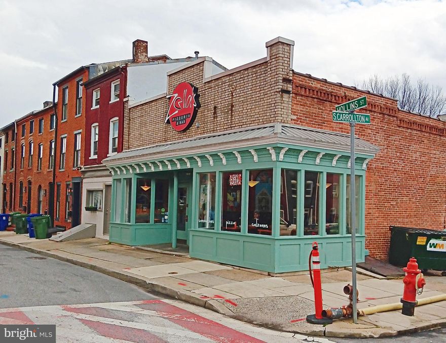 Be a part of the Hollins Market revitalization! This end of the group townhome is a great investment portfolio. It  offers 1980 square feet of living space and can be used to a variety of purposes including restaurant, retail store, storage, or it can be renovated into an office. The location is in a strategic location and conveniently close to the market, local dining, schools and commuter routes. It is also few blocks to the University of Maryland Baltimore and 8 minutes away from Downtown Baltimore. Don't miss this opportunity, schedule your showings today!